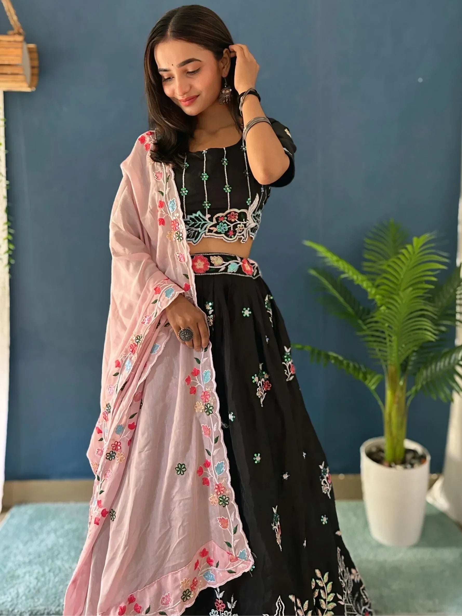 Black floral embroidered lehenga choli with pink dupatta, Indian ethnic wear for women