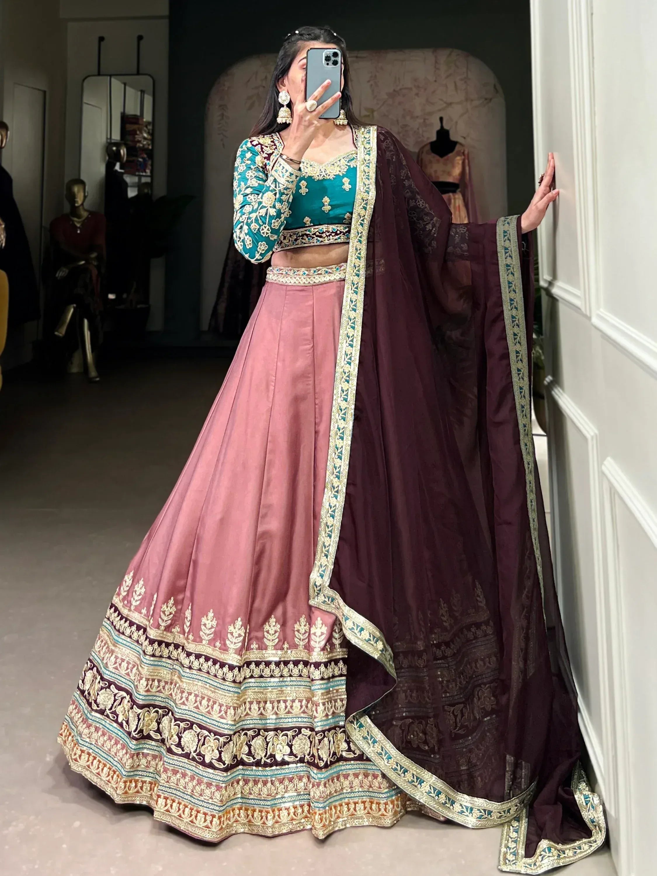 Teal and pink embroidered lehenga choli with maroon dupatta, Indian ethnic wear for weddings