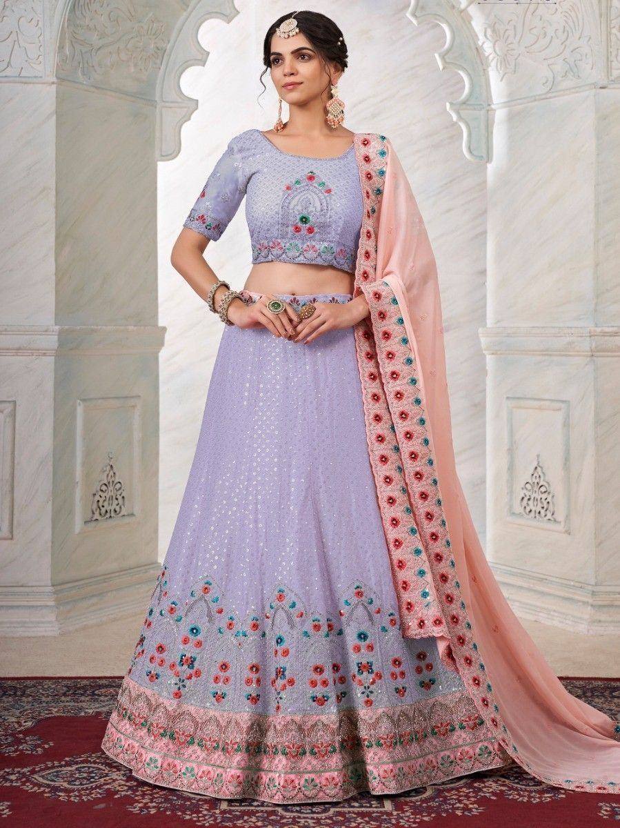 Lavender designer lehenga choli with floral embroidery and pink dupatta, perfect for Indian ethnic occasions