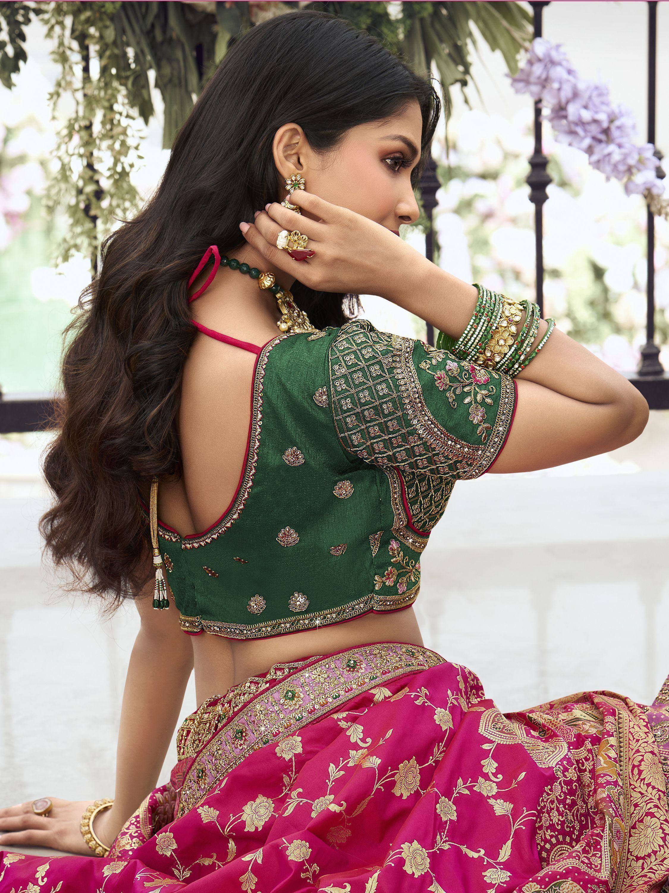 Green embroidered blouse with pink lehenga, traditional Indian ethnic wear for women