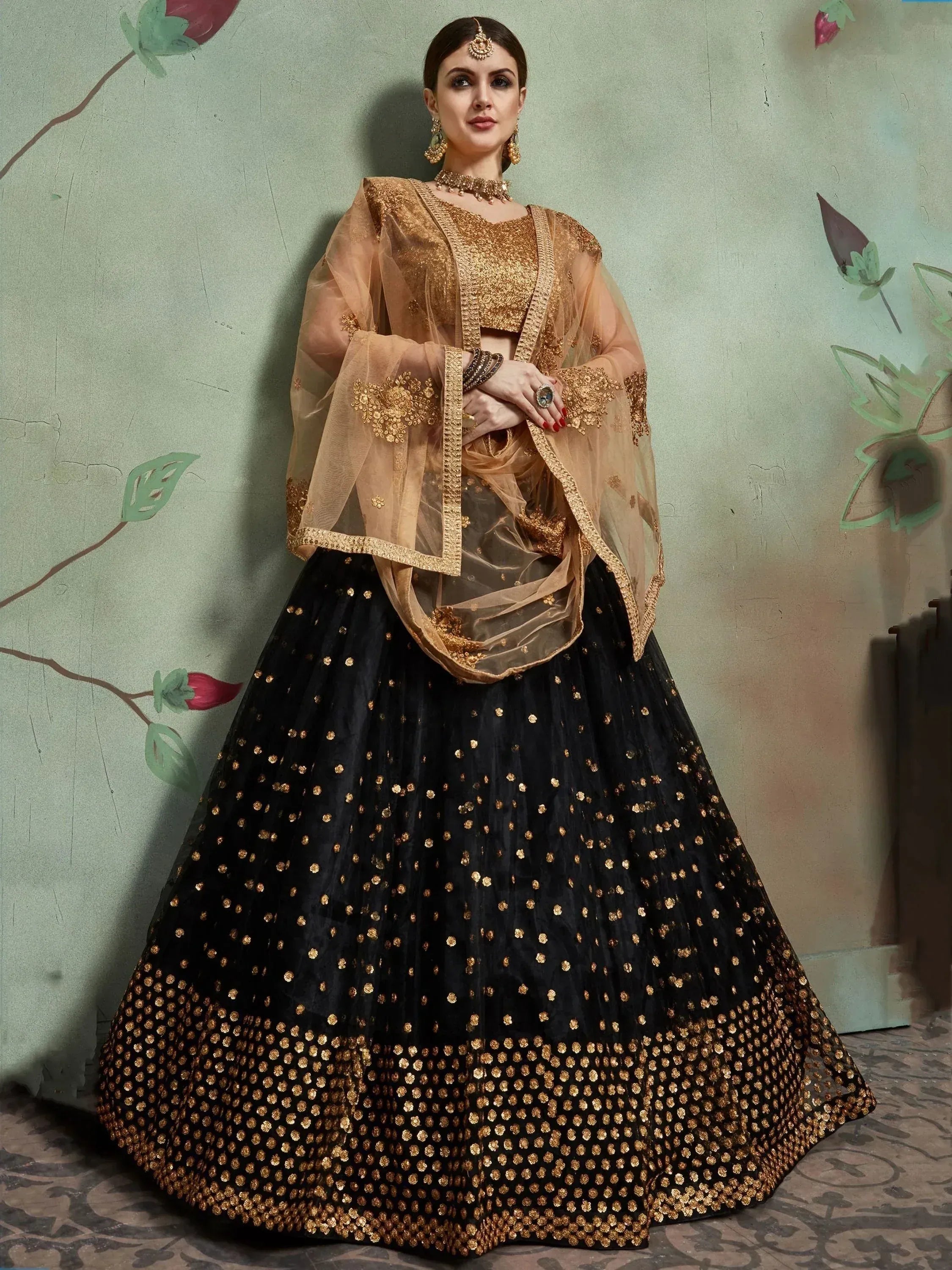 Black and gold embroidered lehenga choli with sheer dupatta, Indian ethnic wear for weddings and parties
