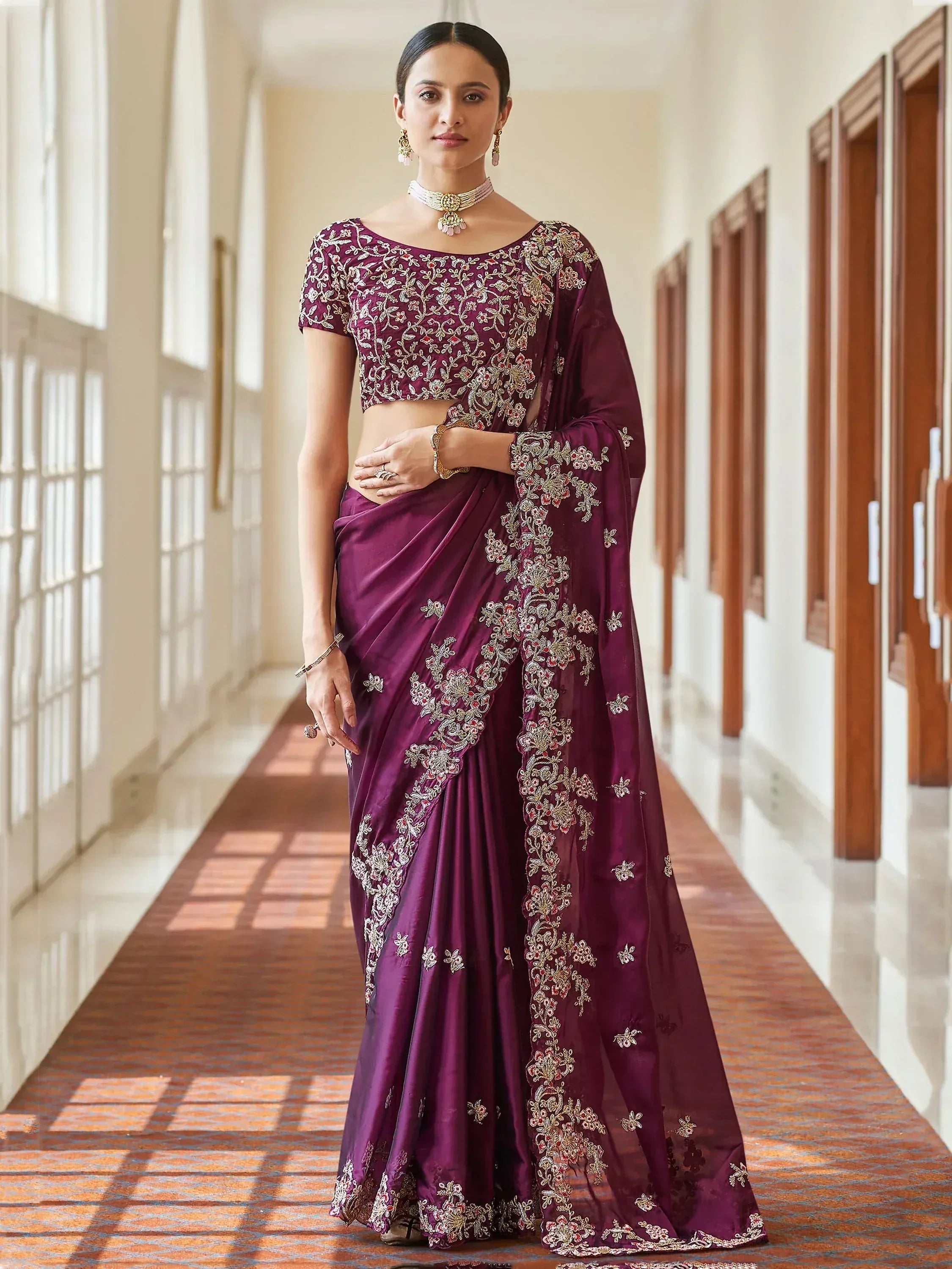 Elegant purple embroidered saree with floral zari work, perfect for Indian ethnic wear occasions
