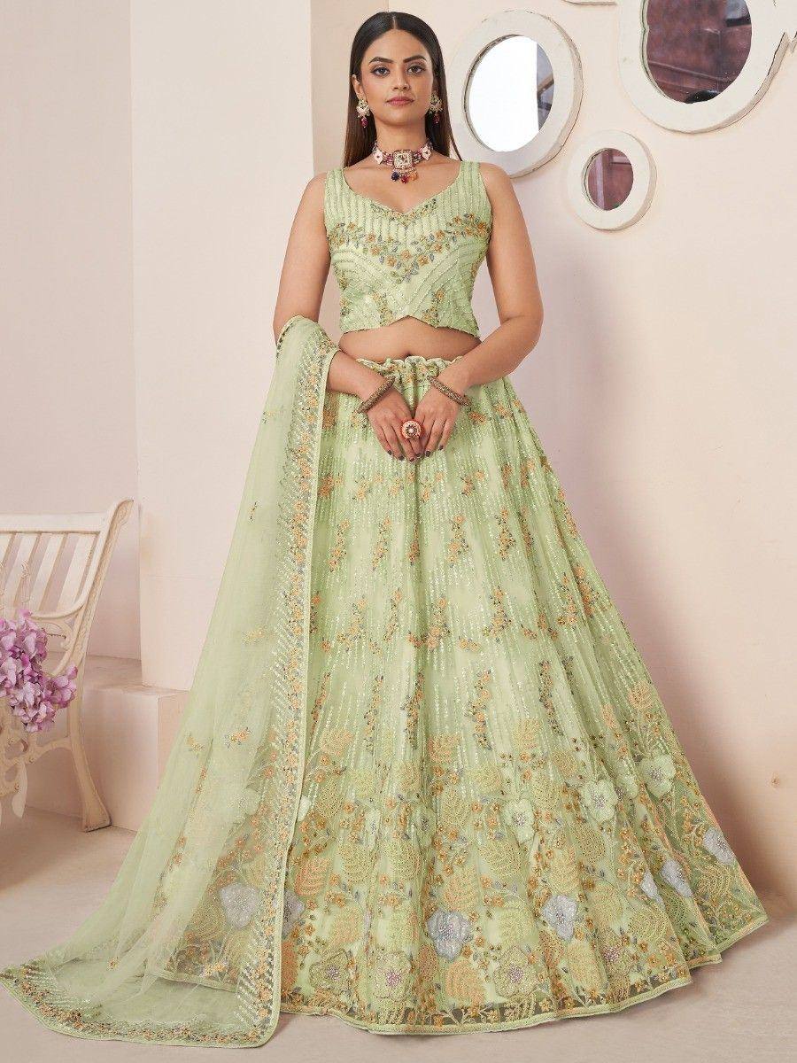 Mint green embroidered lehenga choli with floral motifs, perfect for Indian ethnic wear occasions