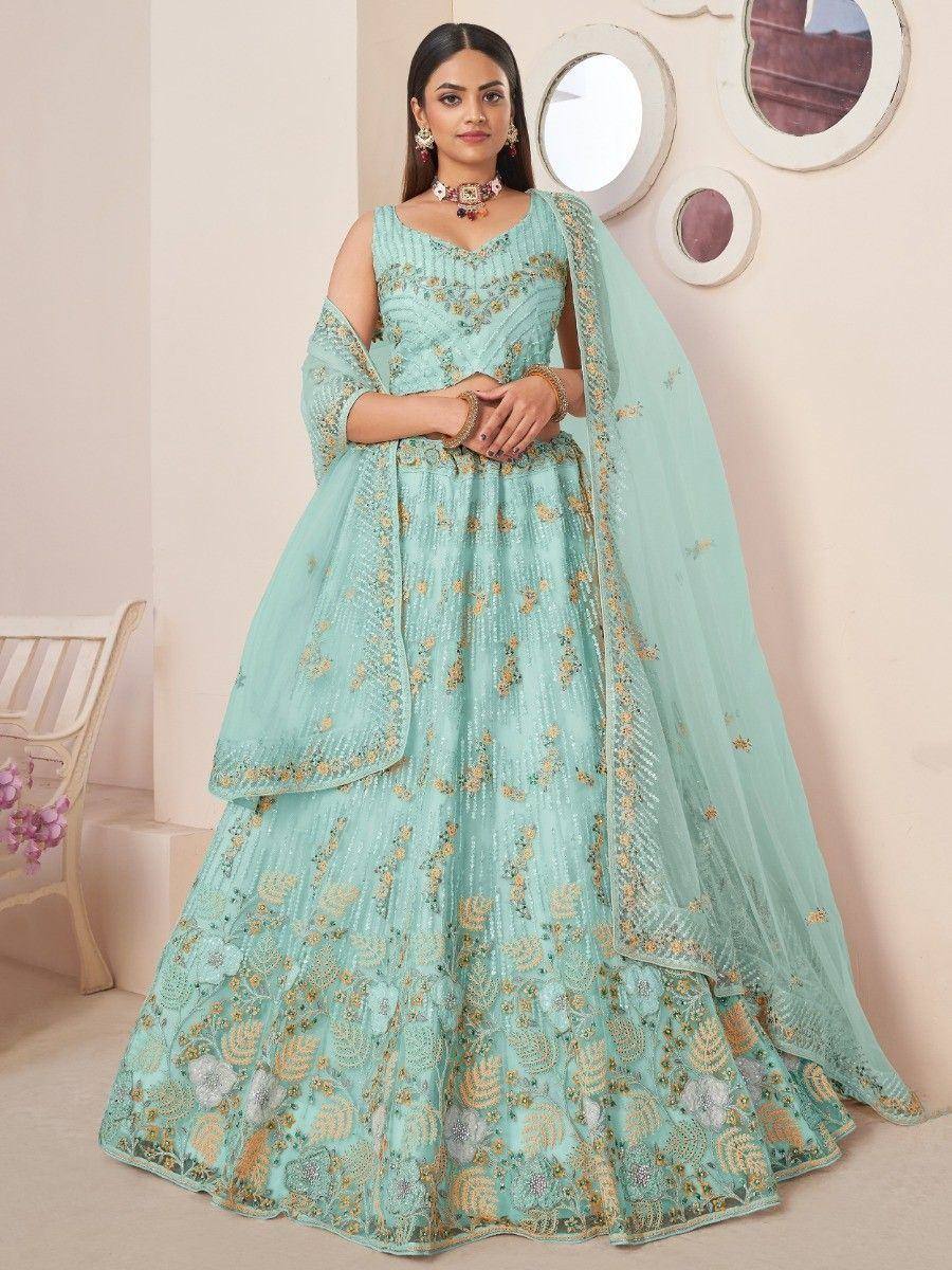 Mint green designer lehenga choli with gold floral embroidery and sheer dupatta, perfect for Indian weddings