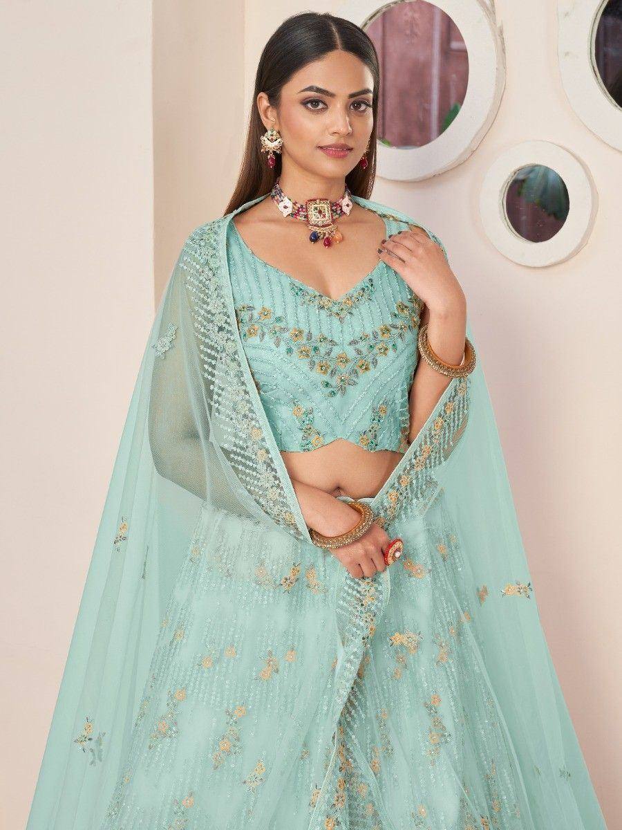 Mint green embroidered lehenga choli with floral motifs and sheer dupatta, perfect for Indian ethnic occasions