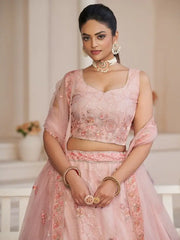 Attractive Pink Sequins Net Wedding Lehenga Choli With Dupatta