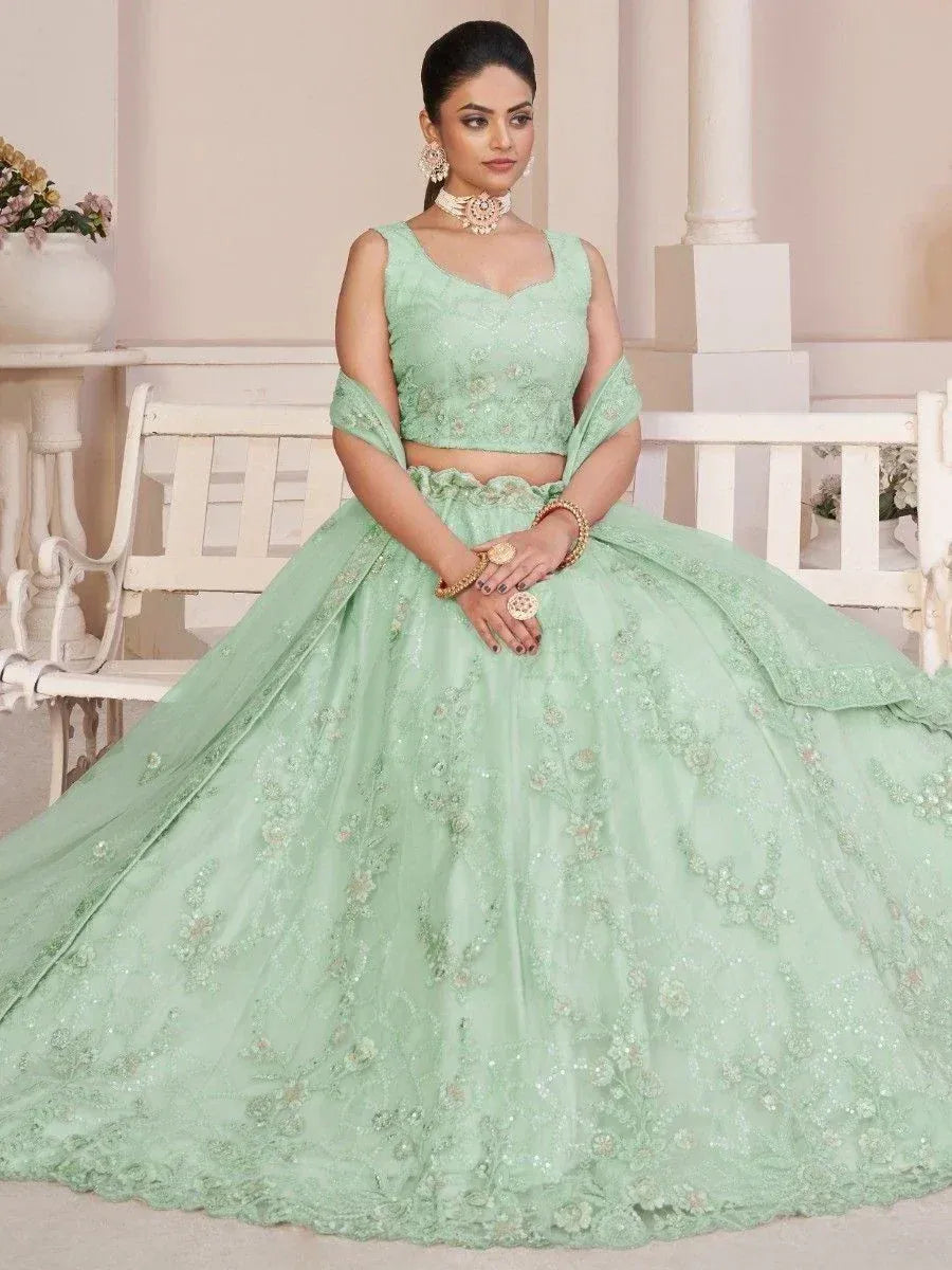 Mint green designer lehenga choli with floral embroidery, perfect for weddings and festive occasions
