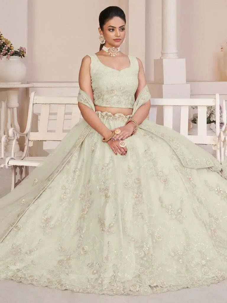 Fascinating White Sequins Net Engagement Wear Lehenga Choli