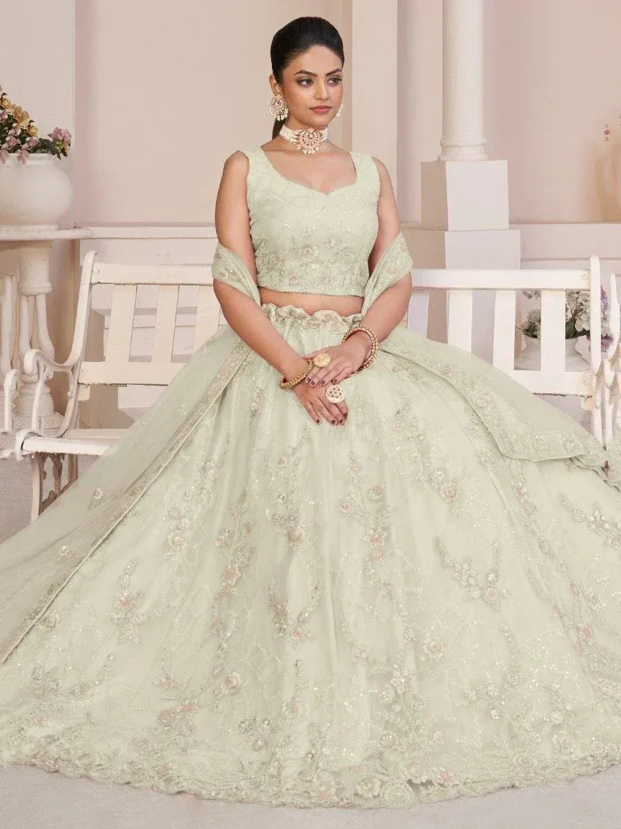 Mint green designer lehenga choli with floral embroidery, perfect for weddings and festive occasions