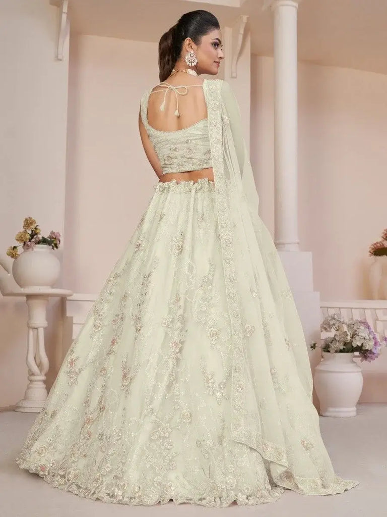 Fascinating White Sequins Net Engagement Wear Lehenga Choli