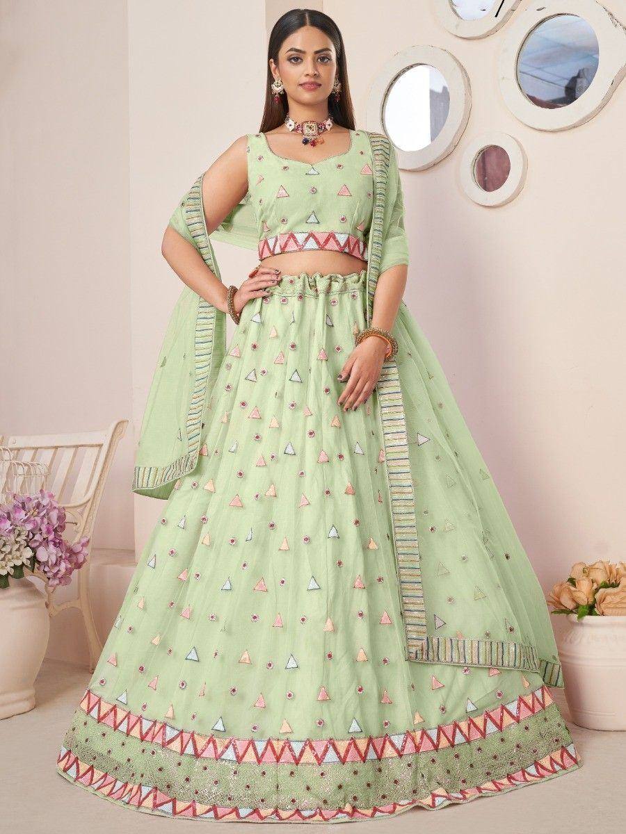 Light green embroidered lehenga choli with geometric patterns, perfect for Indian ethnic wear occasions.