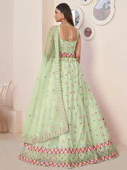 Magnetic Green Sequins Net Festival Wear Lehenga Choli With Dupatta