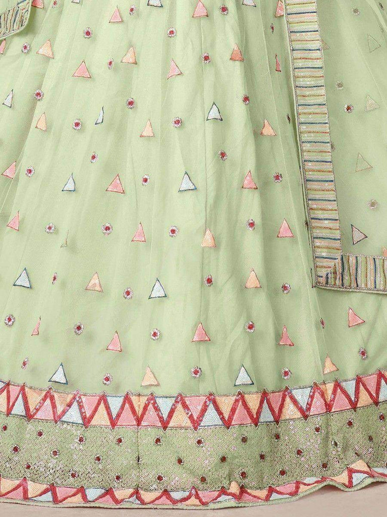 Magnetic Green Sequins Net Festival Wear Lehenga Choli With Dupatta