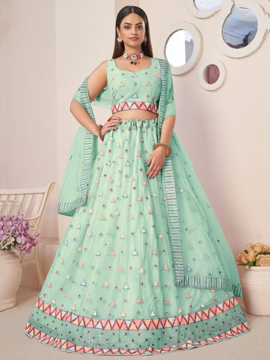 Mint green designer lehenga choli with geometric embroidery, perfect for Indian ethnic wear occasions