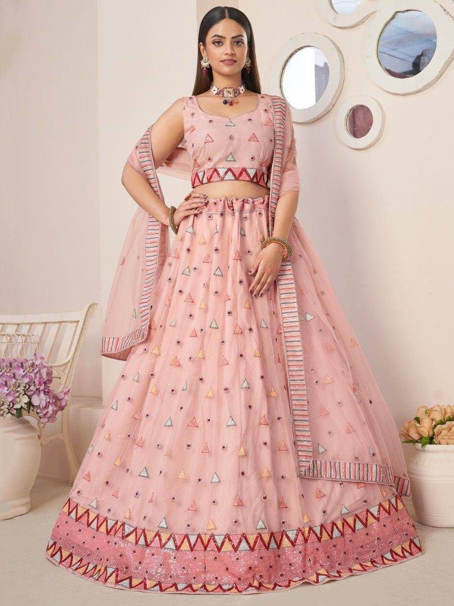 Pink embroidered lehenga choli with geometric patterns, perfect for Indian ethnic wear and festive occasions