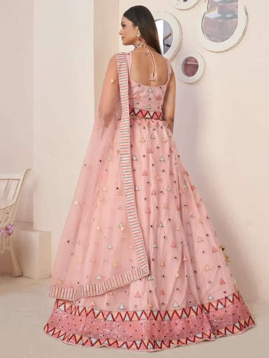 Pink designer lehenga choli with geometric embroidery, perfect for Indian ethnic wear occasions