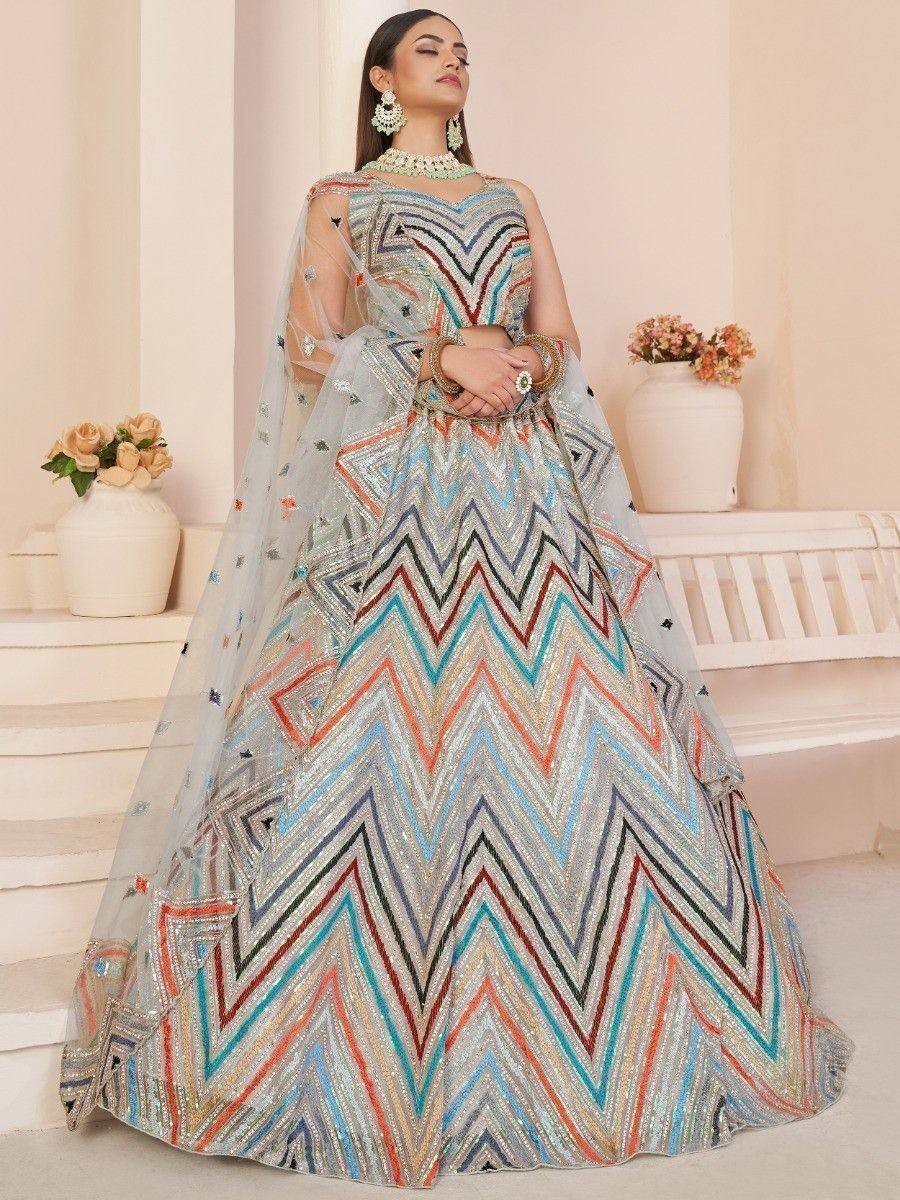 Designer lehenga choli with colorful zigzag embroidery, perfect for Indian ethnic wear occasions