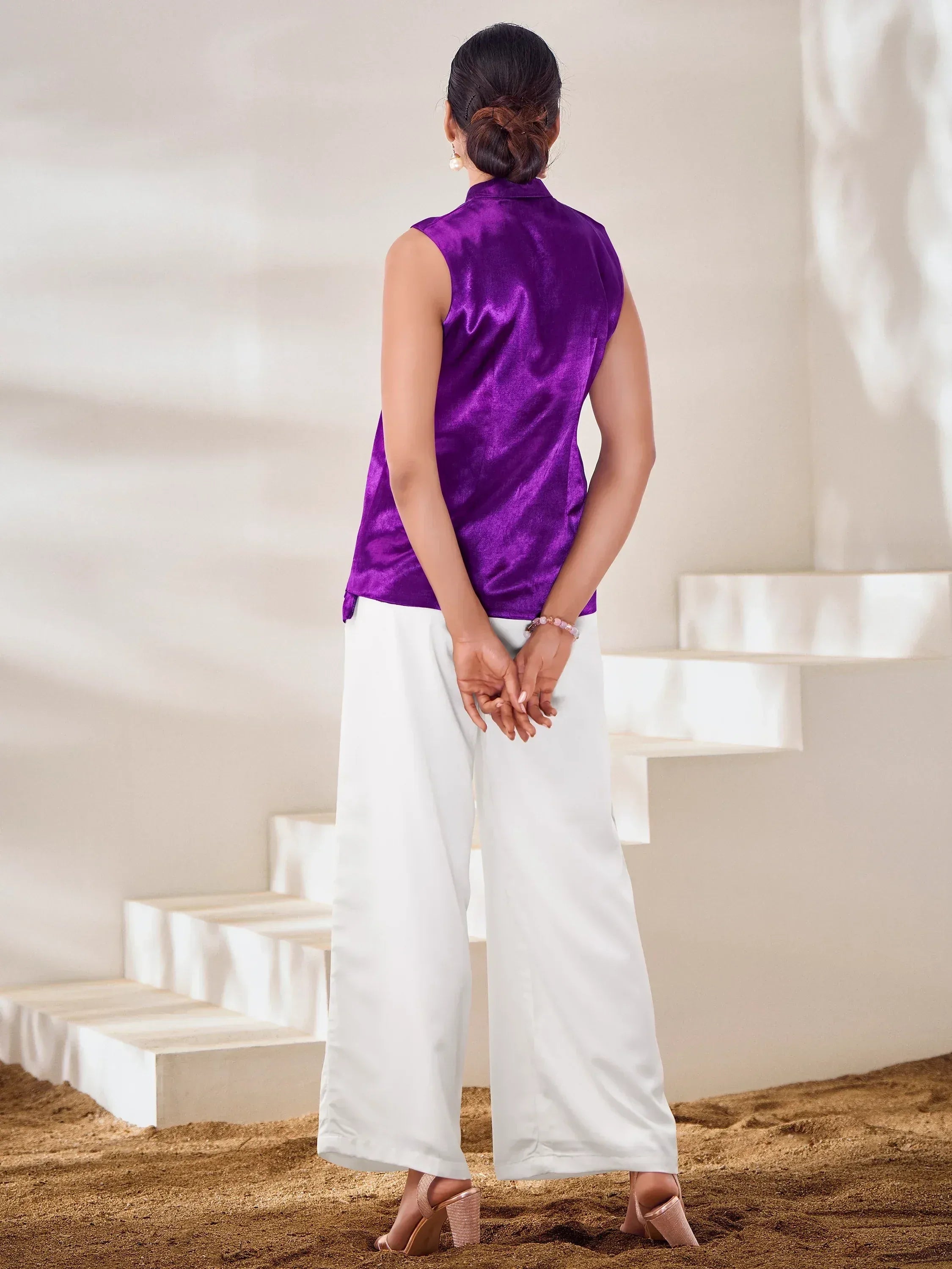 Purple sleeveless satin top with white palazzo pants, ethnic wear outfit