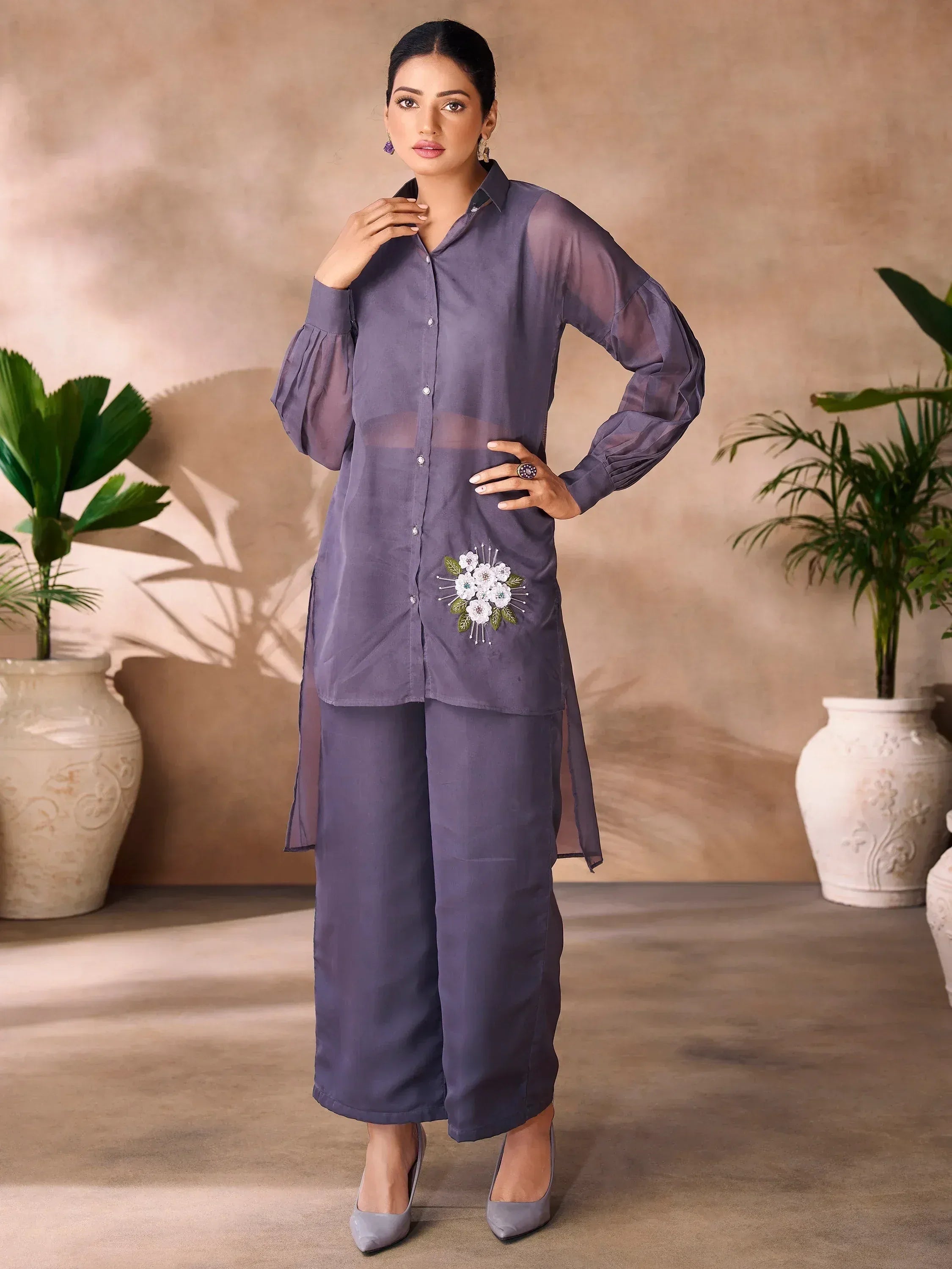 Purple ethnic kurta set with floral embroidery, sheer sleeves, and wide pants for women