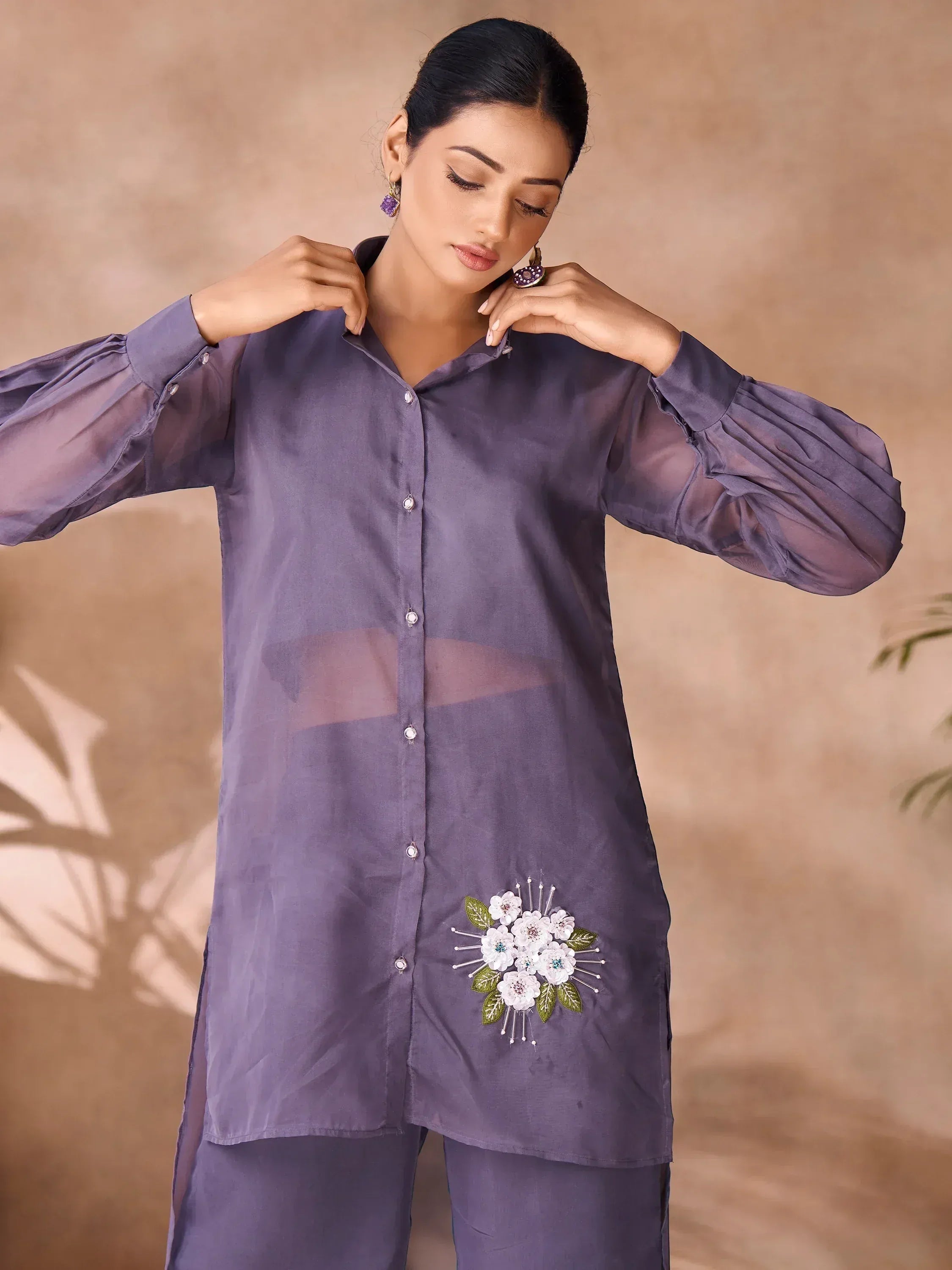 Purple ethnic kurta with floral embroidery and sheer sleeves, paired with matching pants for women