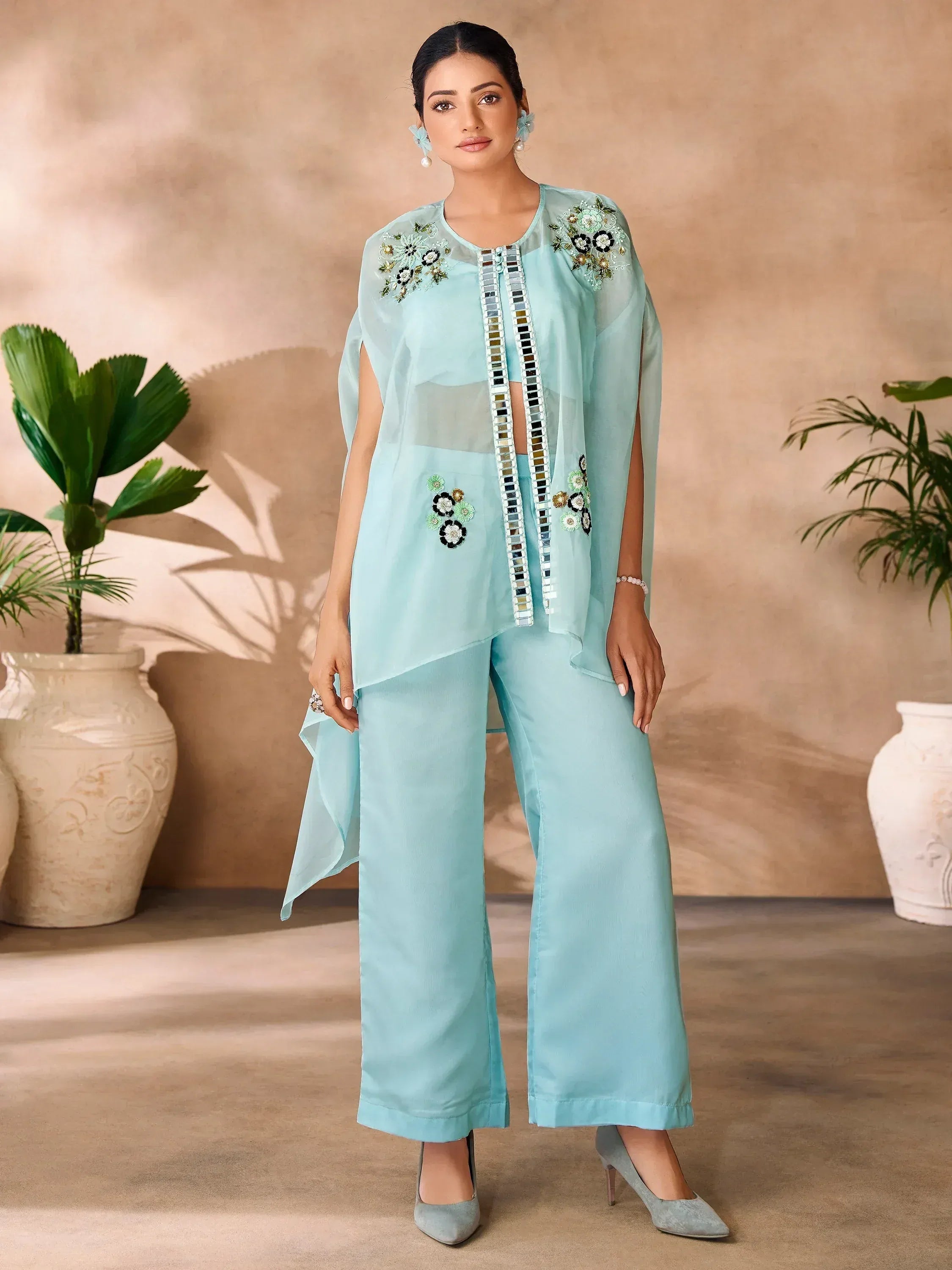 Mint green embroidered ethnic pantsuit with mirror work and floral detailing, perfect for Indian occasions