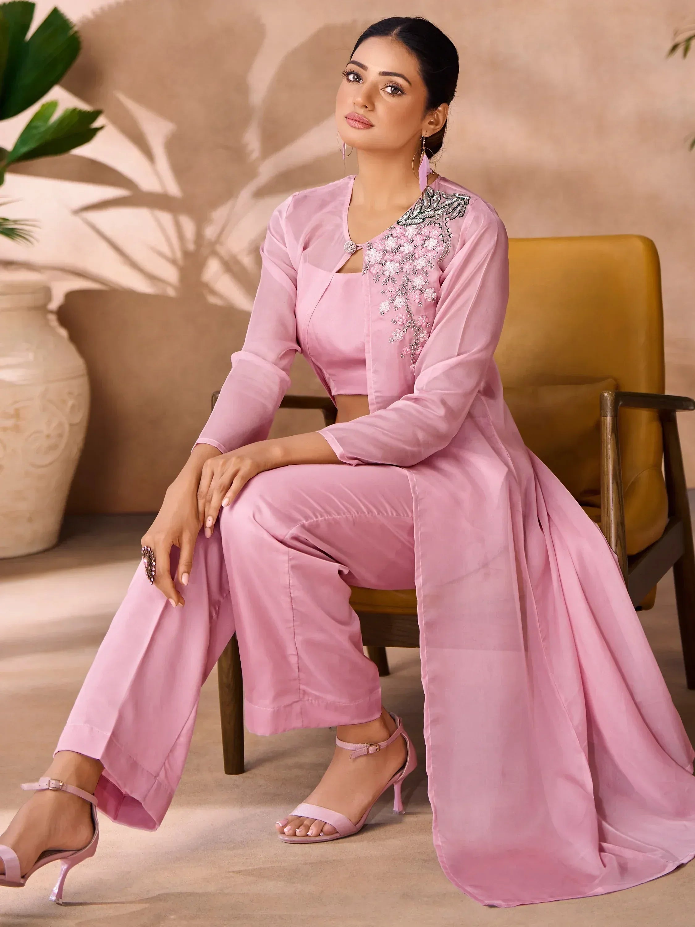 Pink embroidered ethnic suit with palazzo pants and cape, perfect for Indian occasions