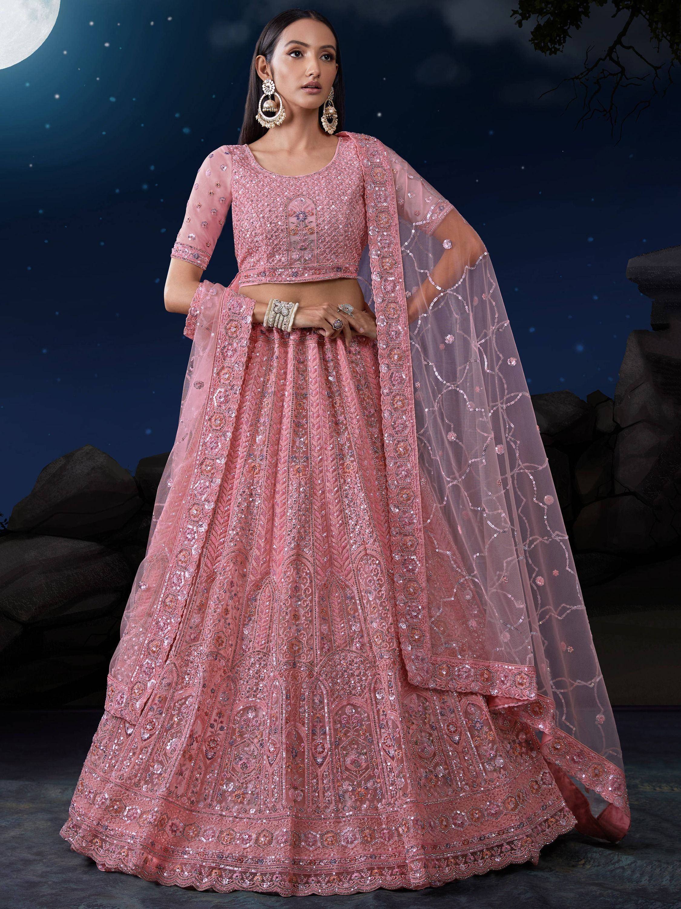 Pink embroidered lehenga choli with sheer dupatta, perfect for Indian weddings and festive occasions