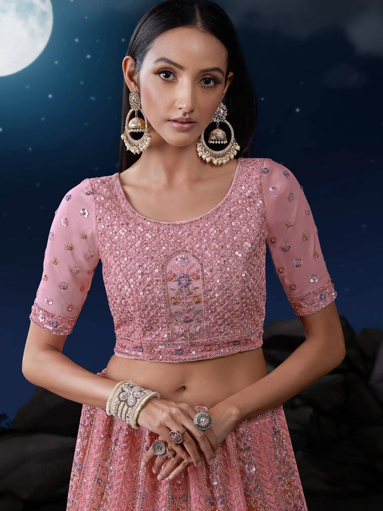 Fascinating Pink Sequins Net Engagement Wear Lehenga Choli