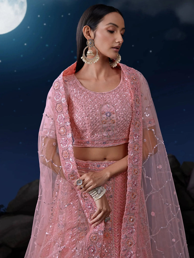 Fascinating Pink Sequins Net Engagement Wear Lehenga Choli