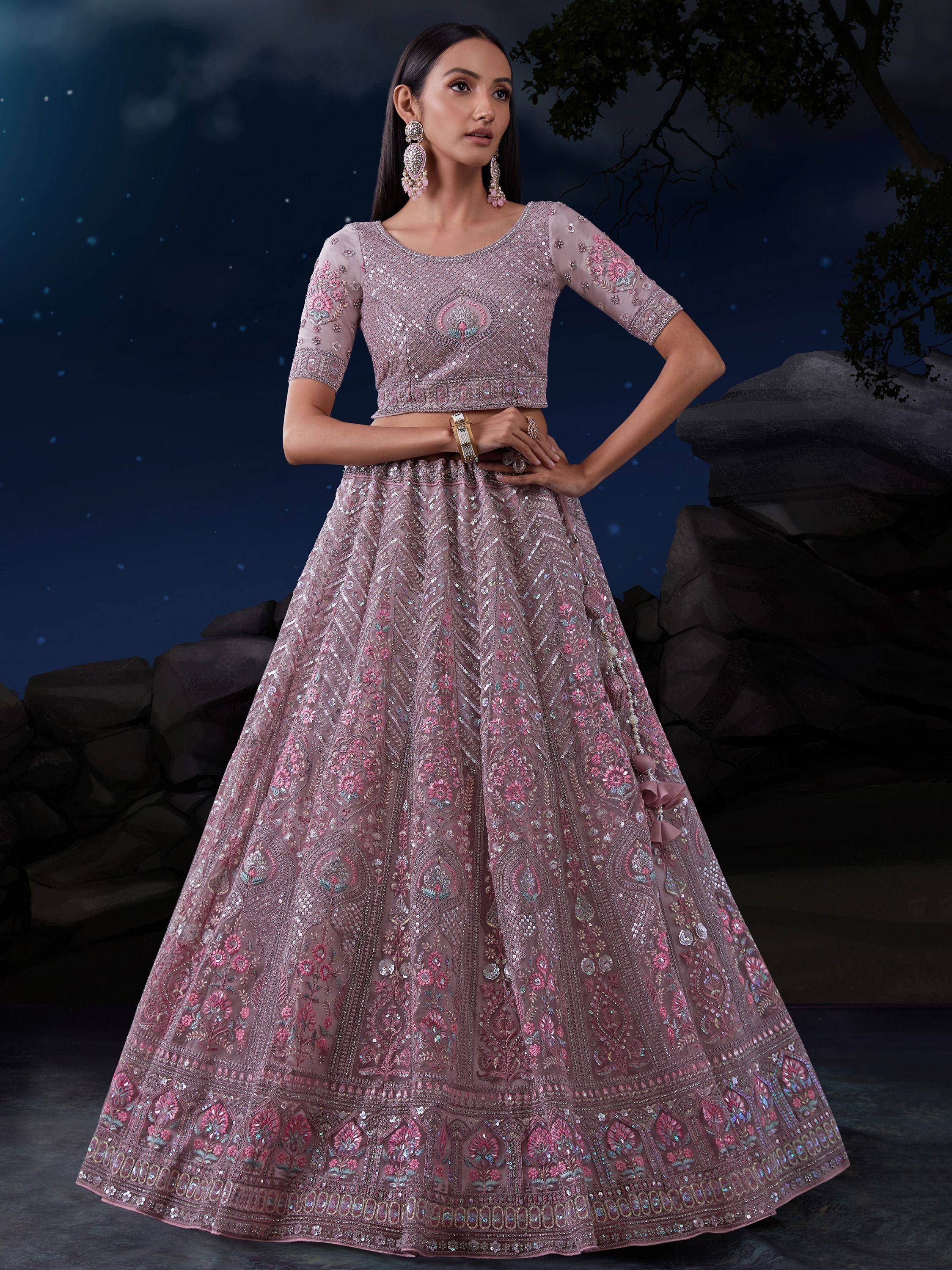 Pink embroidered lehenga choli with sequins, perfect for Indian weddings and festive occasions