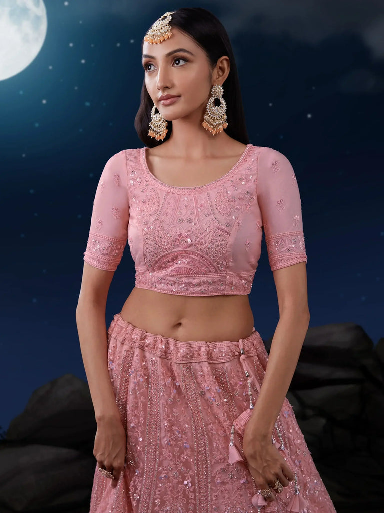 Mesmerizing Pink Sequins Net Engagement Wear Lehenga Choli