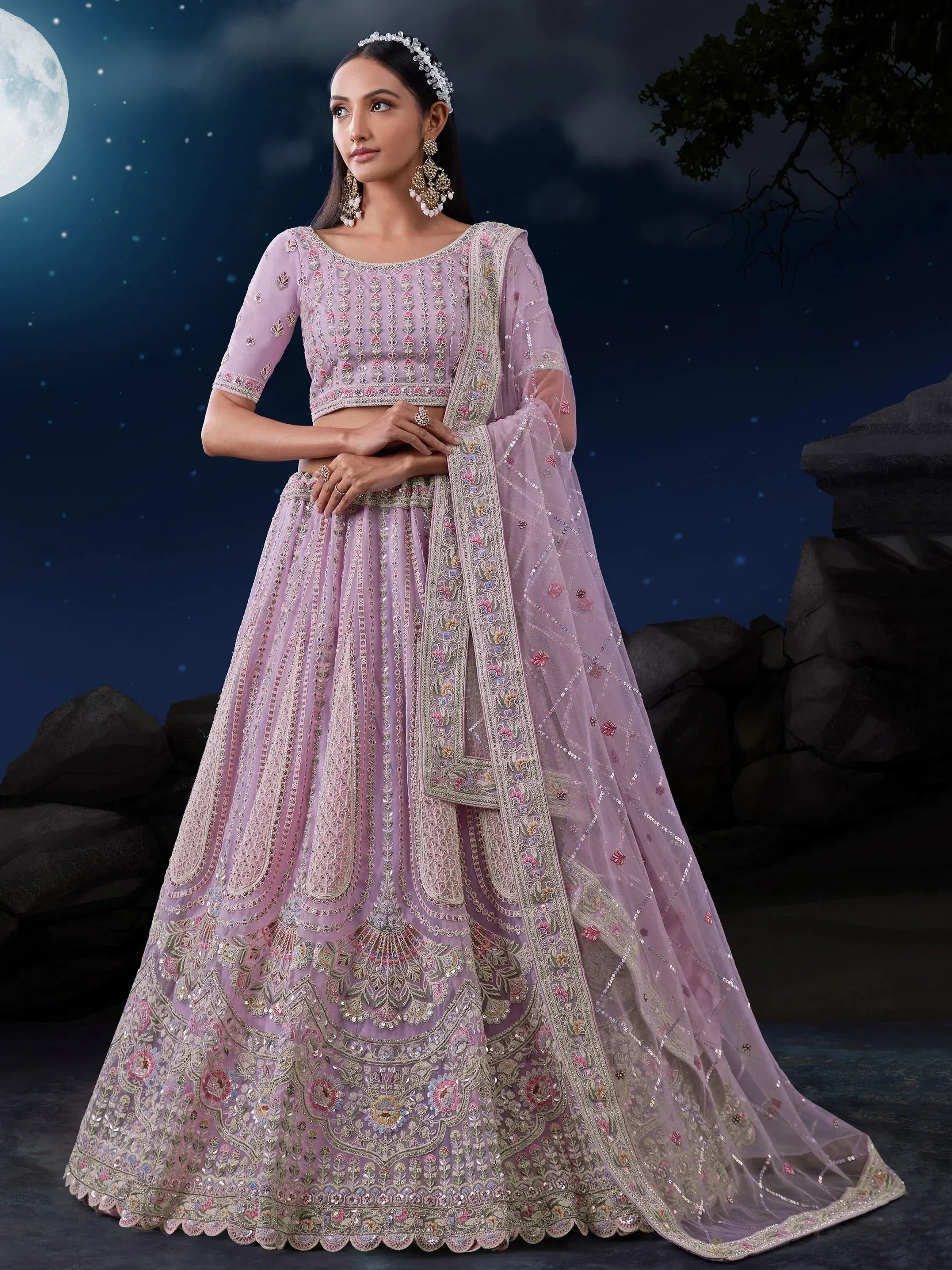 Elegant lavender lehenga choli with intricate embroidery, perfect for Indian weddings and festive occasions.