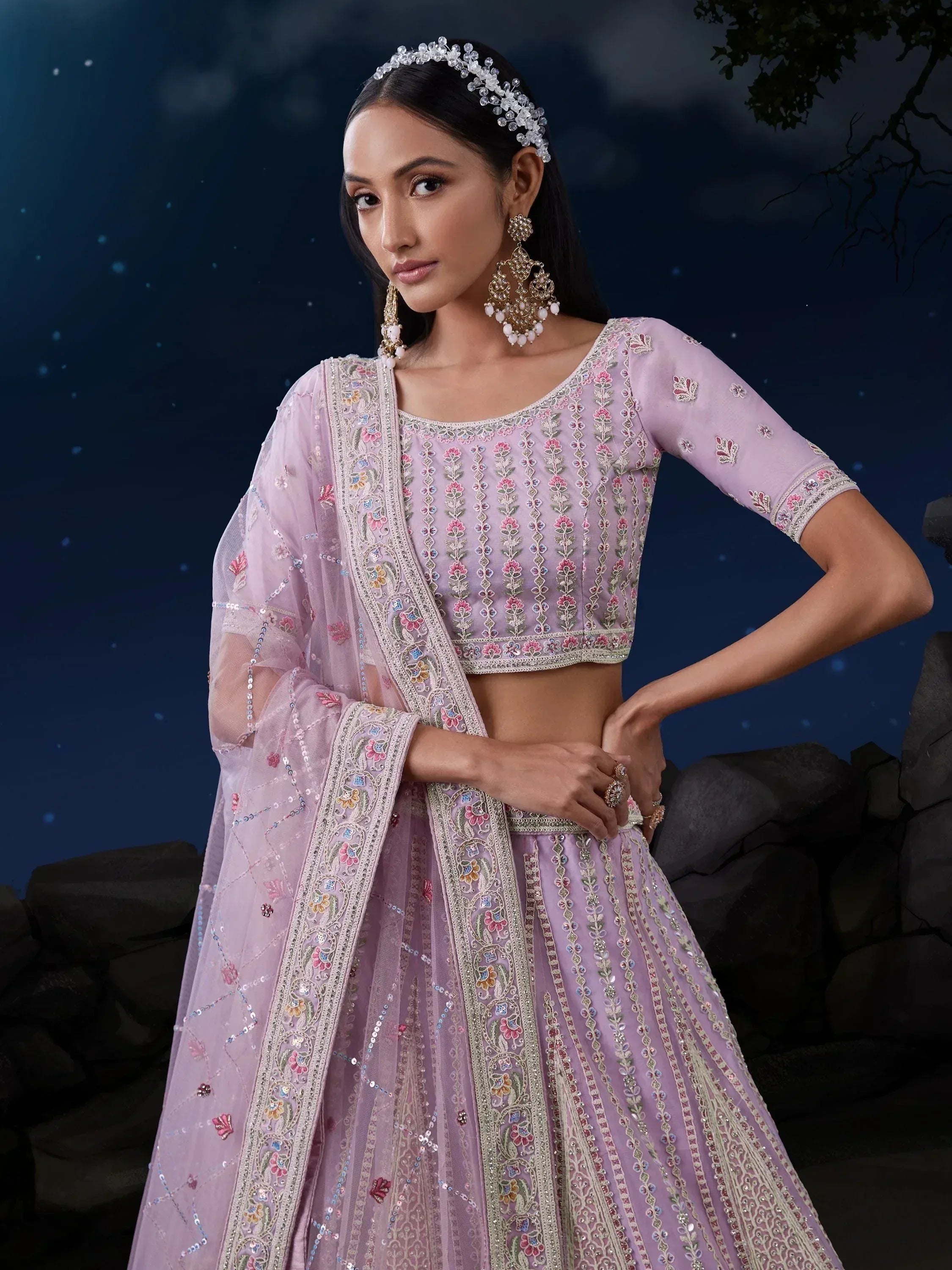 Elegant lavender lehenga choli with floral embroidery, perfect for Indian ethnic wear and festive occasions.