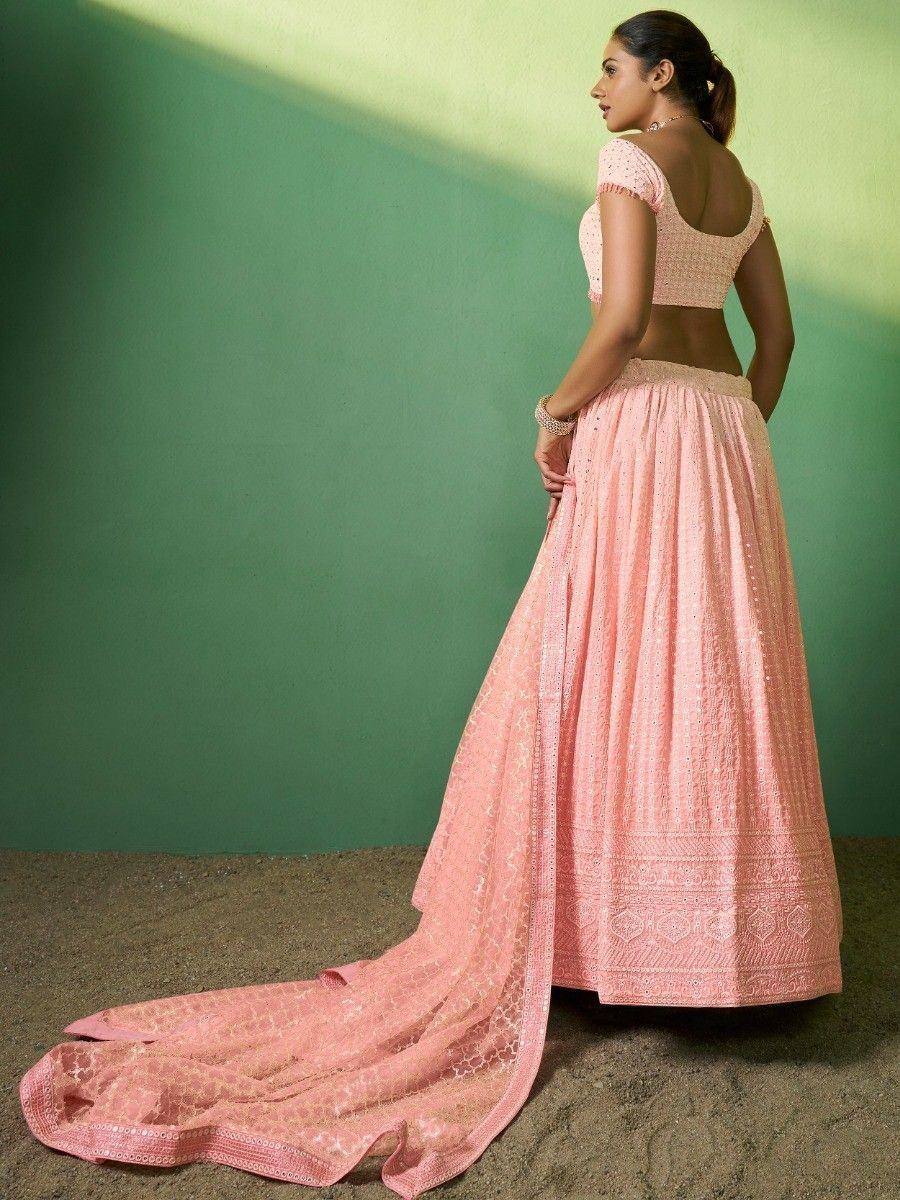 Pink embroidered lehenga choli with backless blouse and long train, ethnic Indian wear
