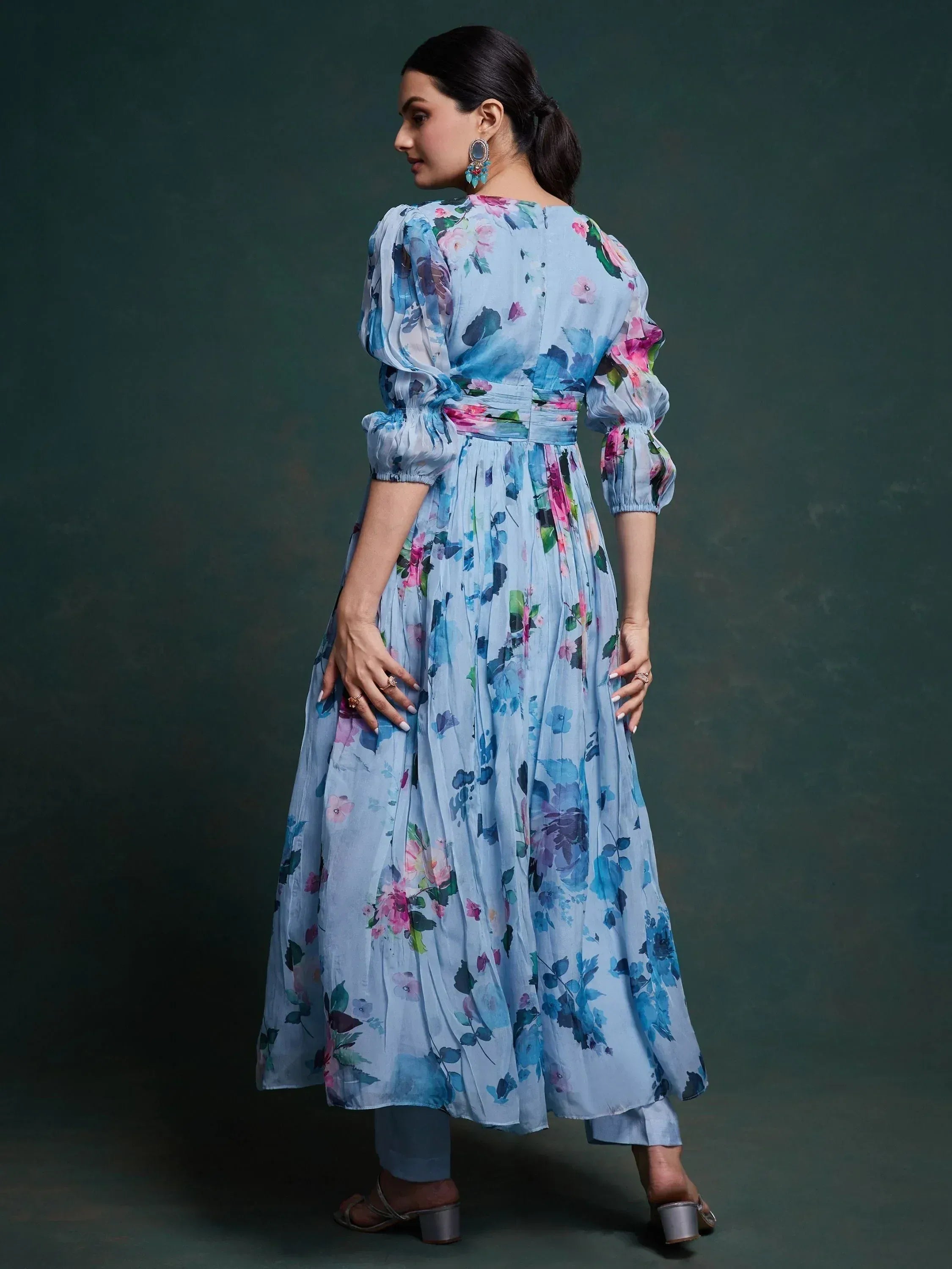 Blue floral ethnic gown with puff sleeves and pleated skirt, perfect for Indian occasions