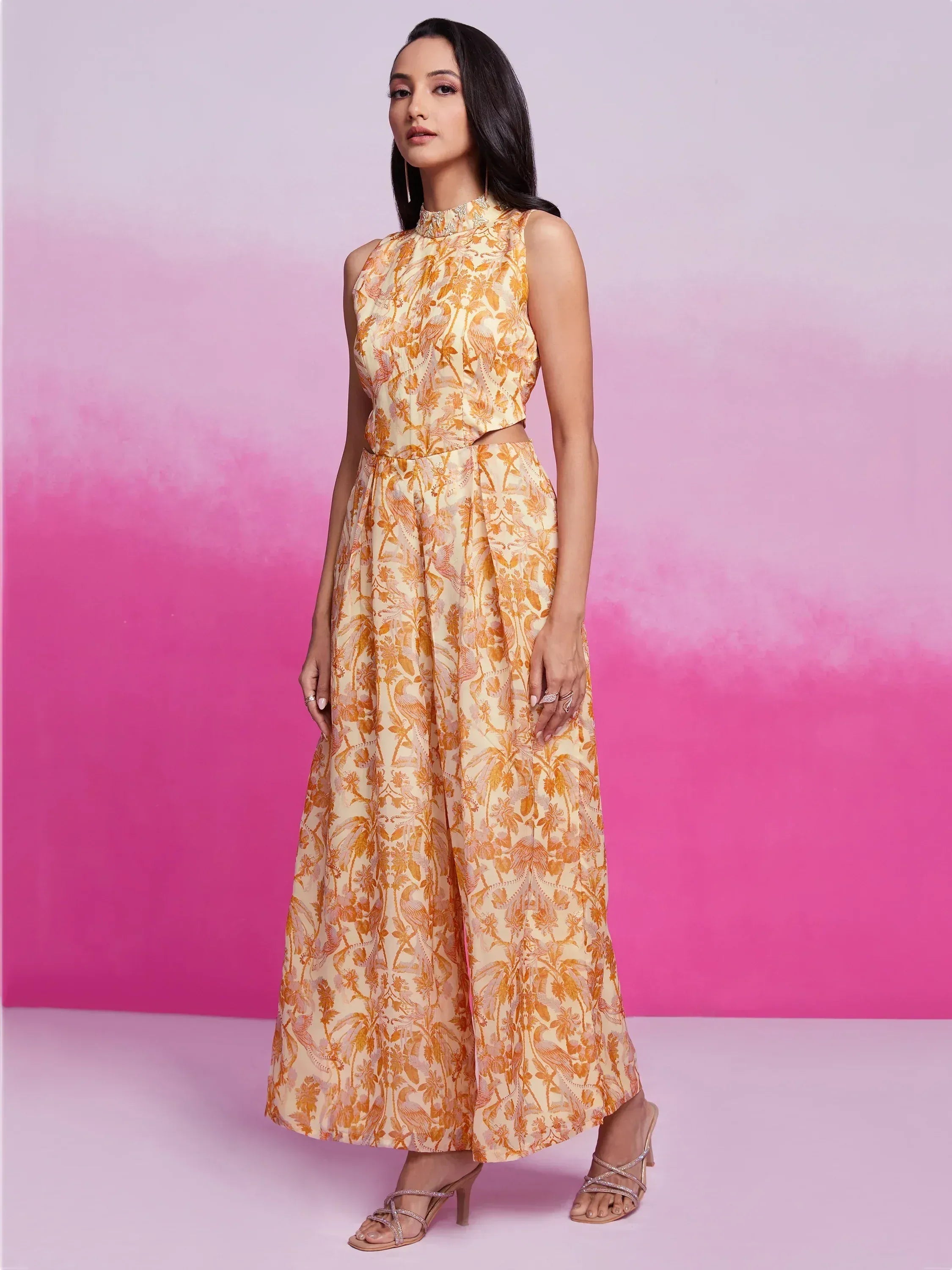 Women's ethnic gown with floral print, sleeveless high-neck design, perfect for Indian occasions