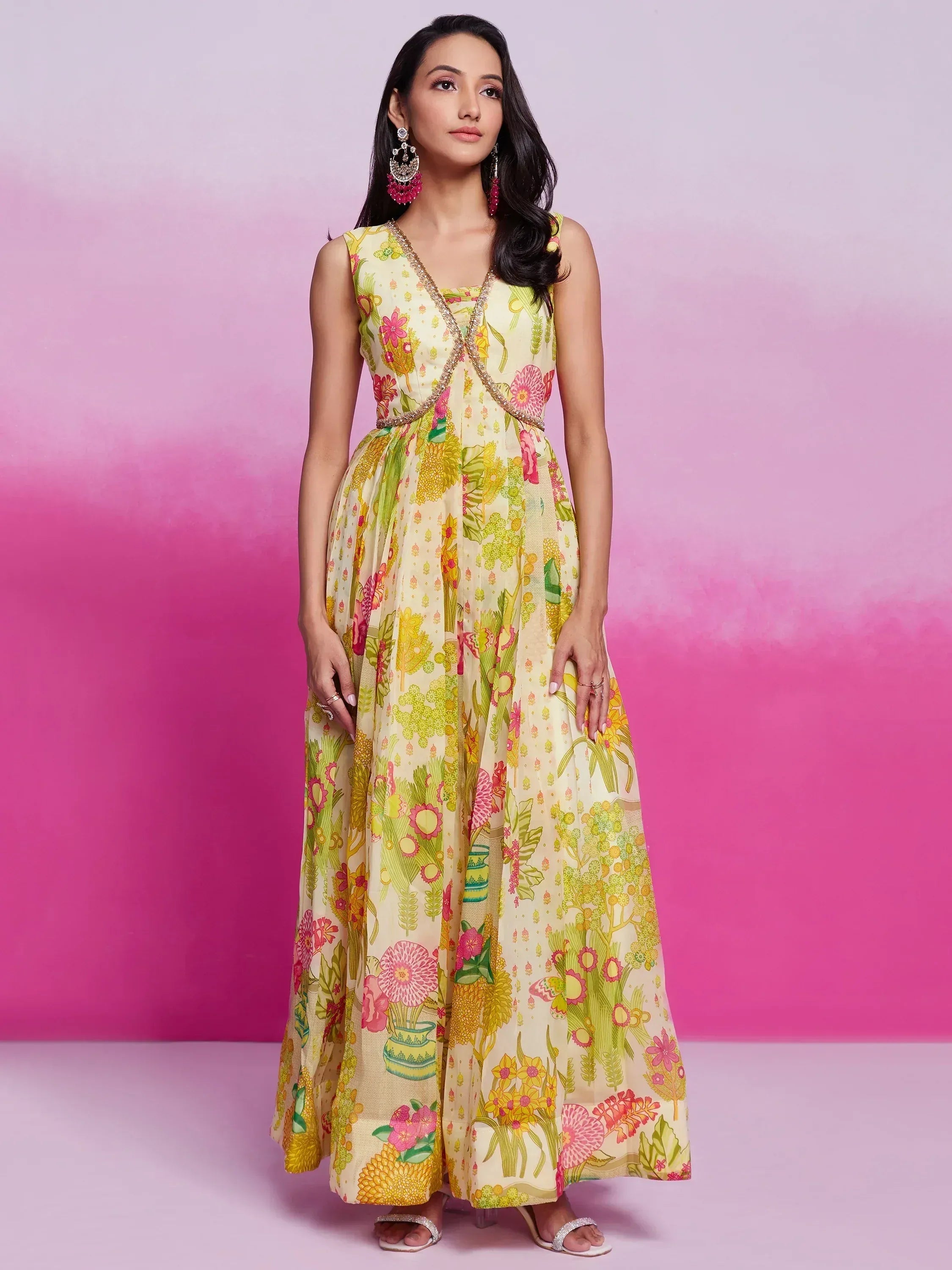 Floral print ethnic gown with V-neck and gold trim, perfect for Indian occasions