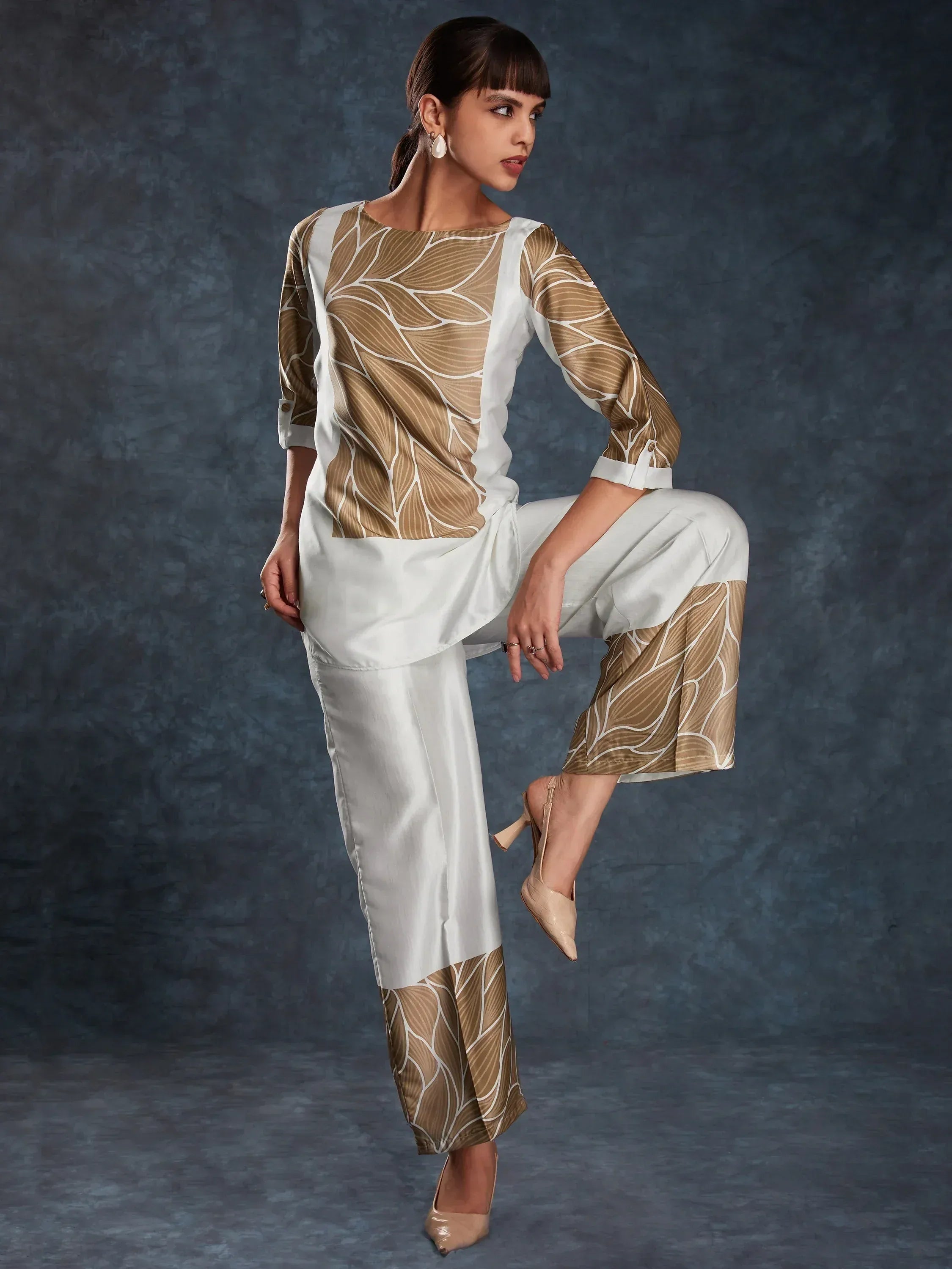 White and gold leaf-print ethnic salwar kameez with wide pants, perfect for modern Indian wear