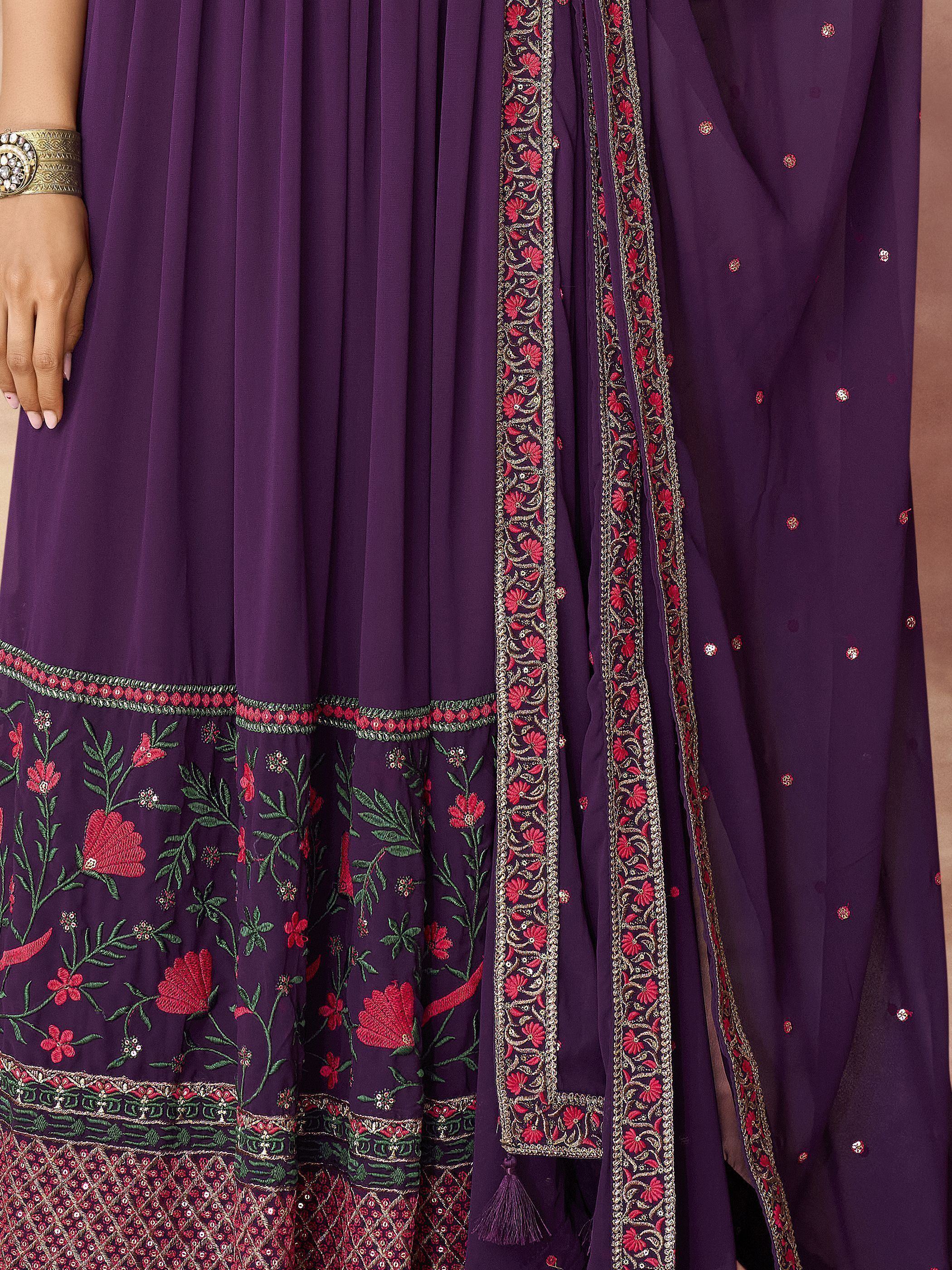 Purple embroidered ethnic gown with floral patterns and matching dupatta