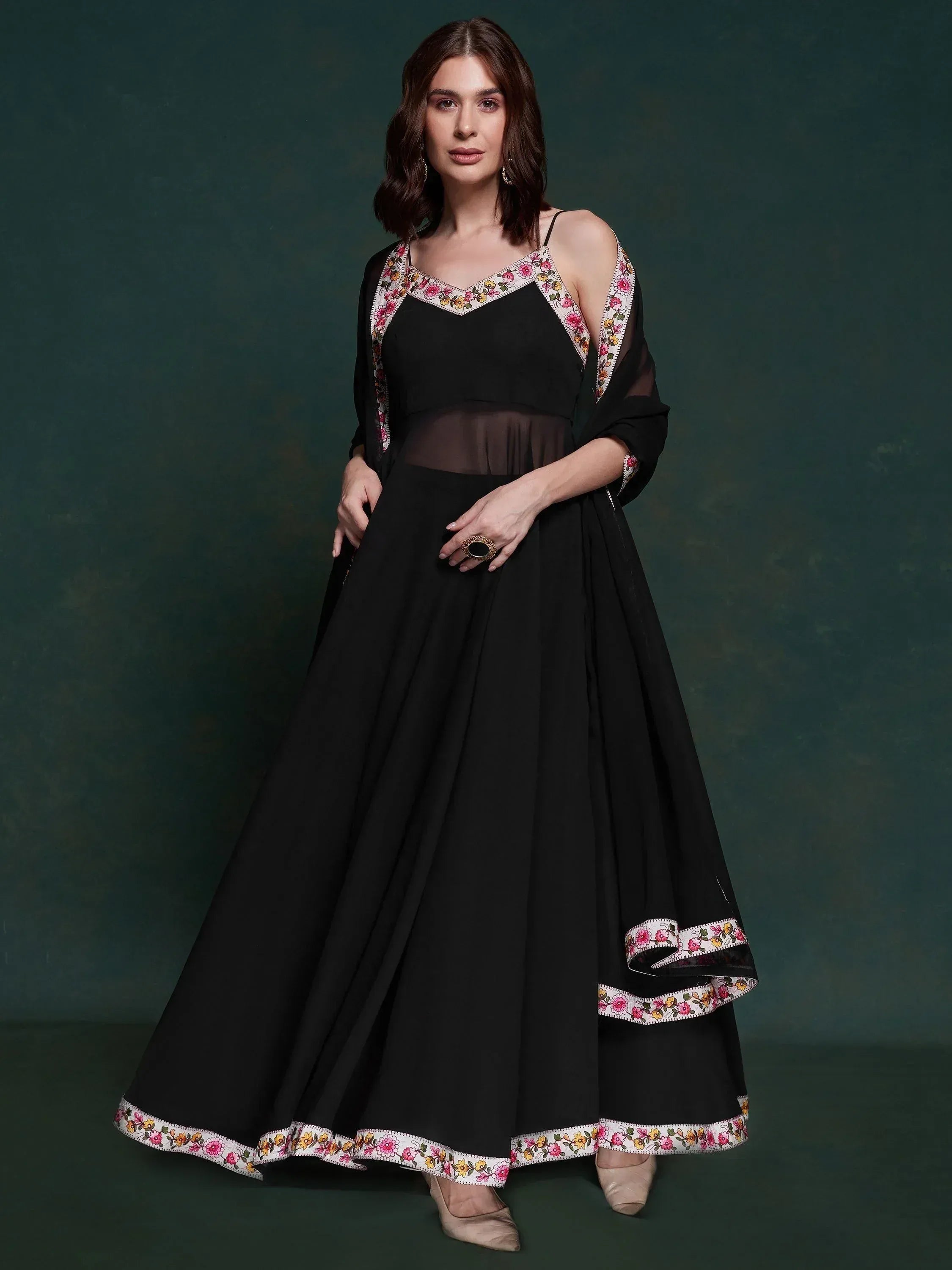 Black ethnic gown with floral embroidery, sheer overlay, and flared skirt for women