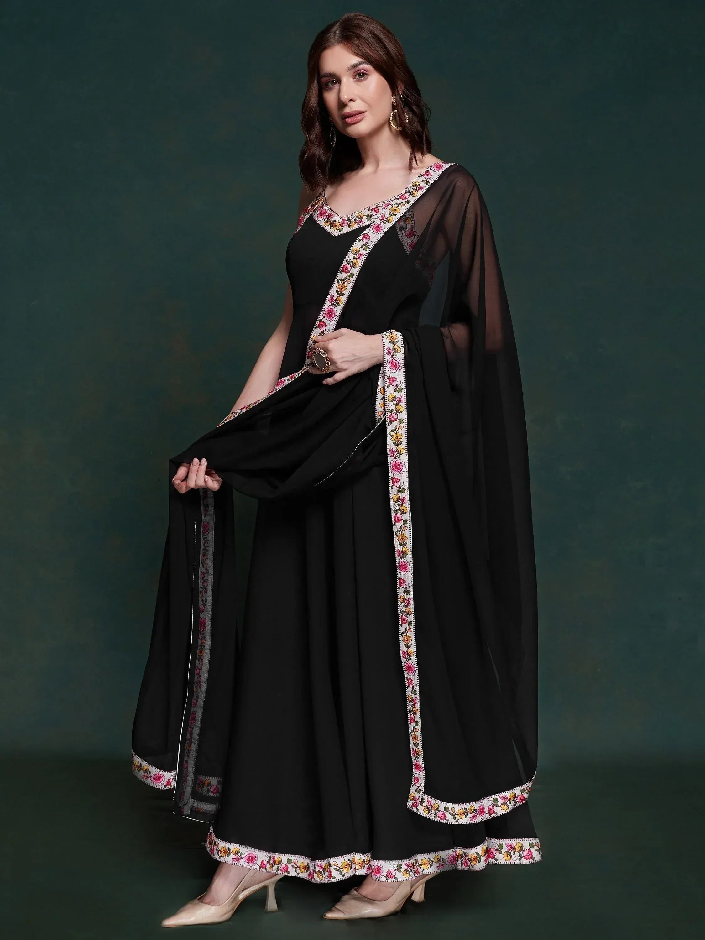 Black ethnic gown with floral embroidery and sheer cape, stylish Indian wear for women