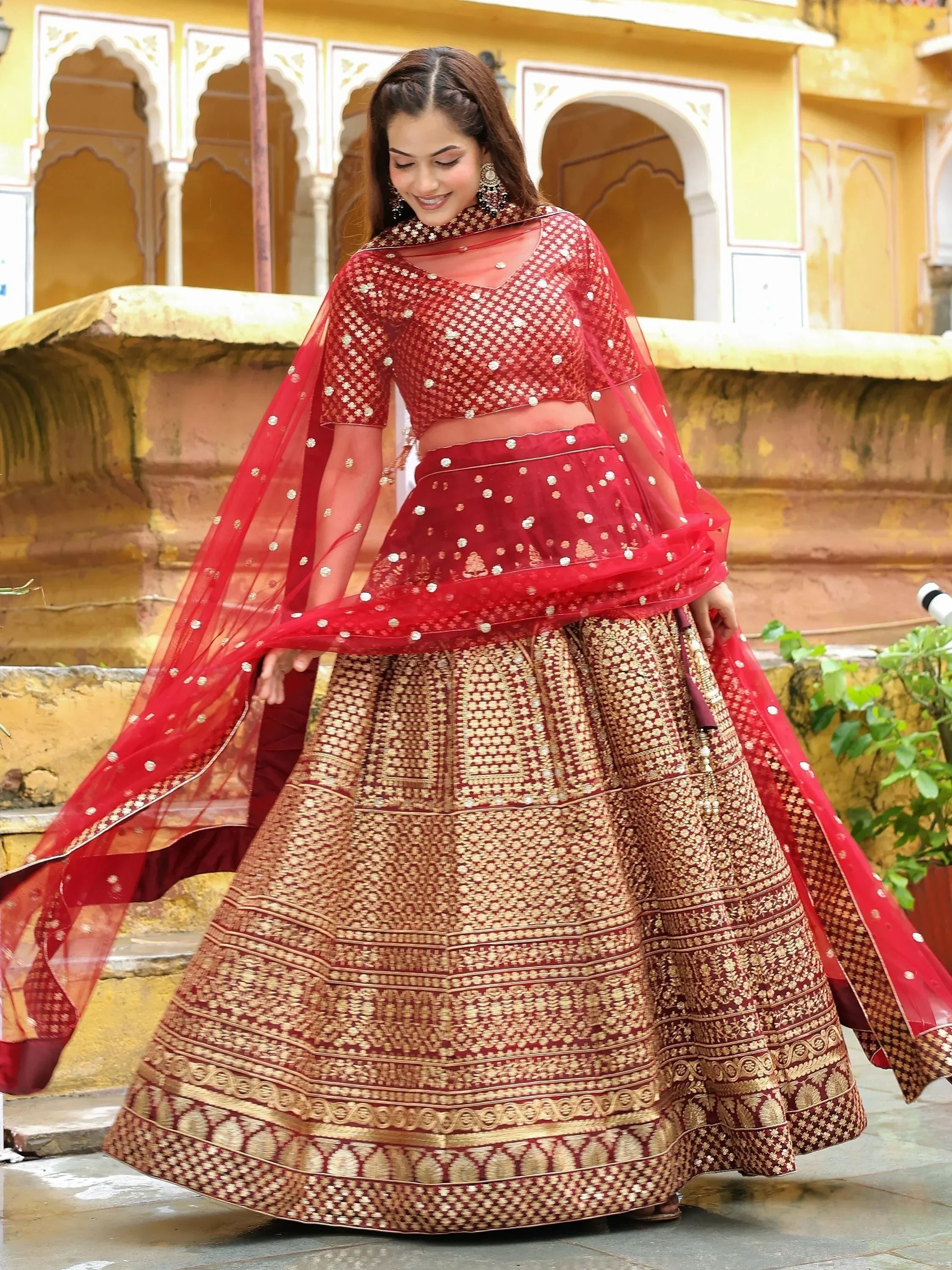 Red and gold embroidered lehenga choli with sheer dupatta, Indian ethnic wear for weddings and festivals