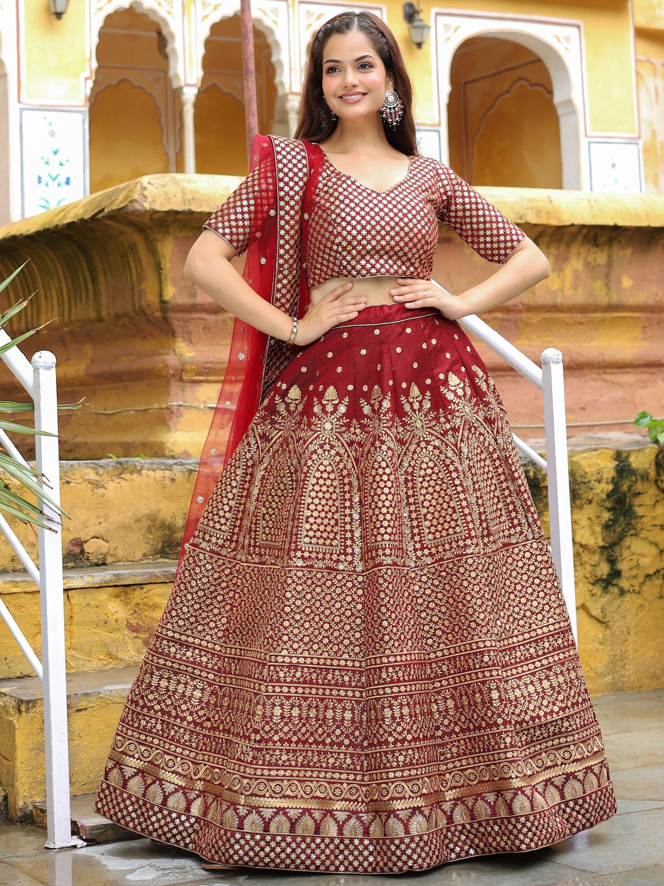 Maroon designer lehenga choli with gold embroidery, perfect for Indian ethnic wear occasions