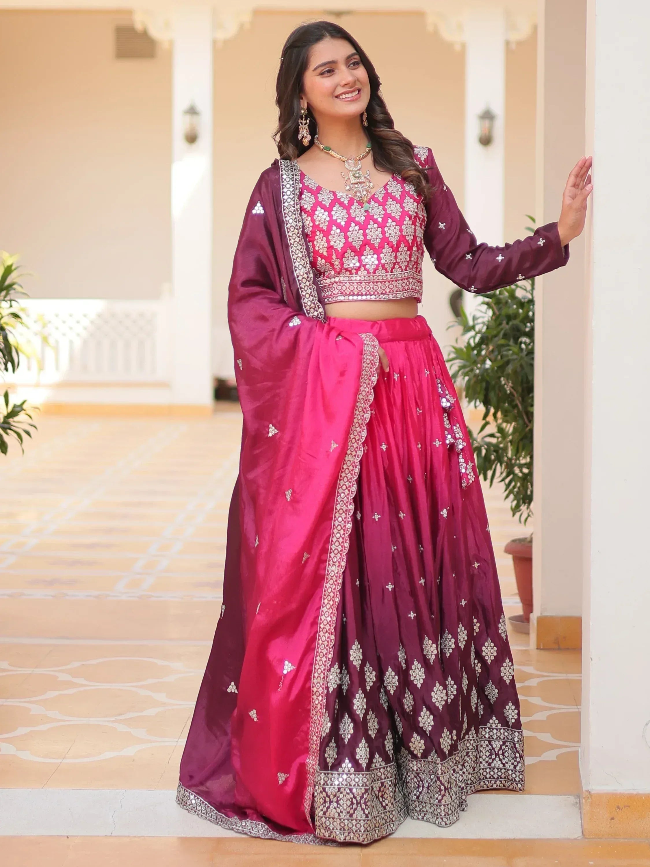 Pink and maroon designer lehenga choli with mirror work, perfect for Indian ethnic wear occasions