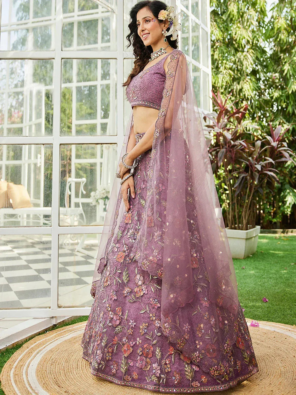 Purple floral embroidered lehenga choli with sheer dupatta, perfect for Indian weddings and festive occasions