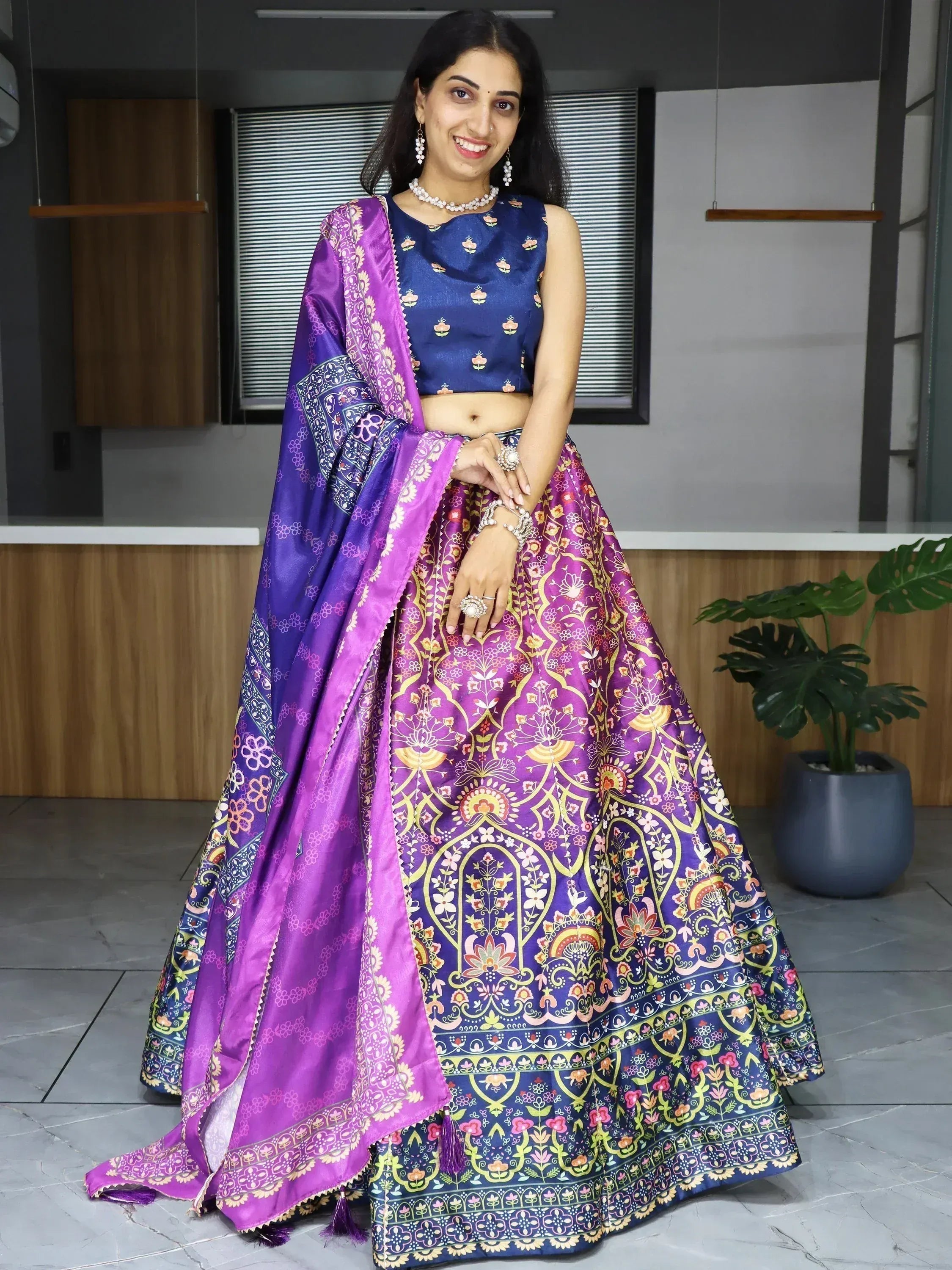 Purple and blue printed lehenga choli with floral patterns, perfect for Indian ethnic wear occasions