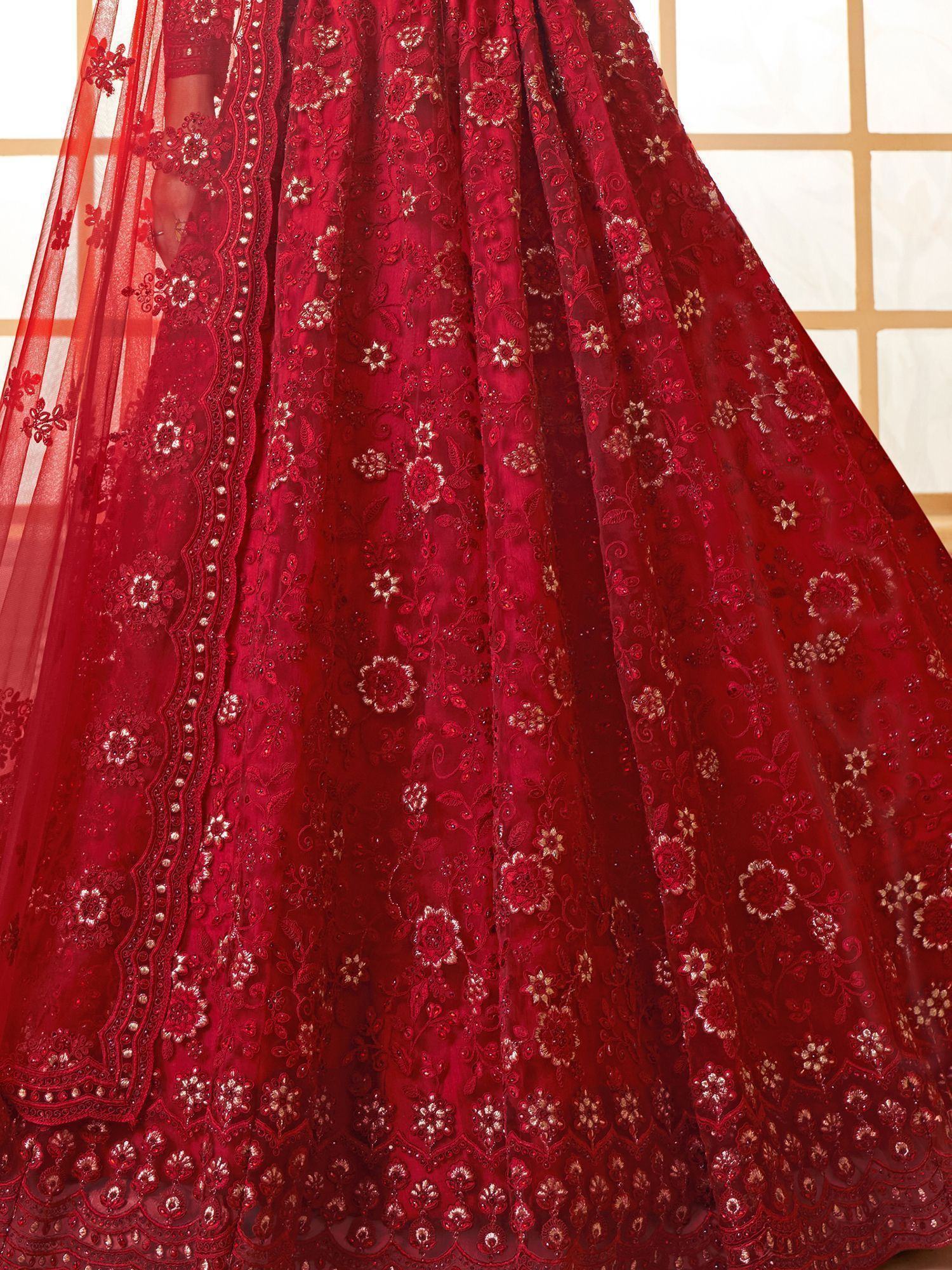 Red embroidered lehenga choli with floral gold detailing and sheer dupatta, perfect for Indian weddings