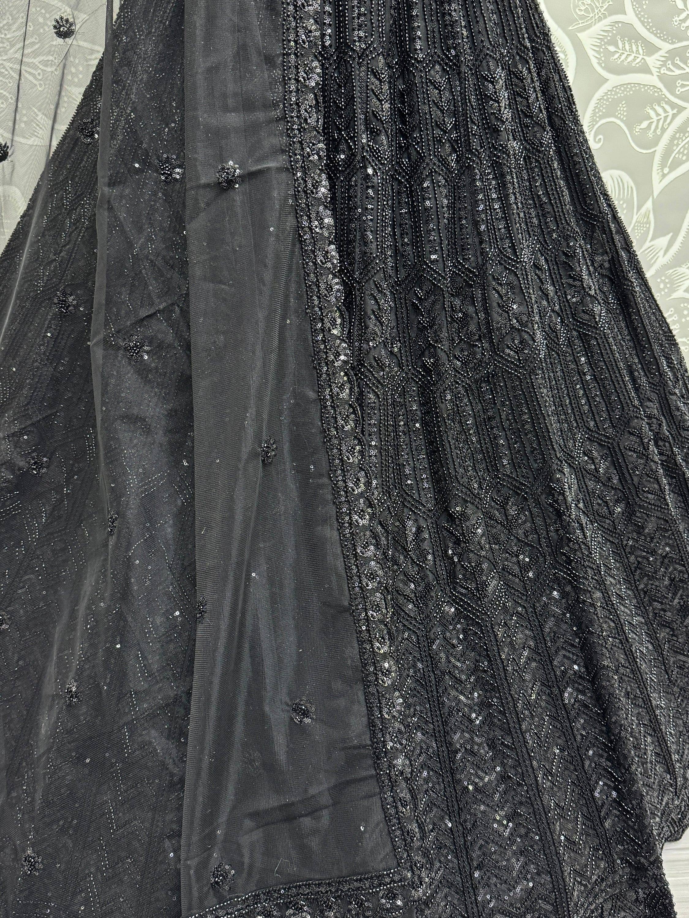 Black embroidered lehenga with sequin work and sheer dupatta, ethnic Indian wear