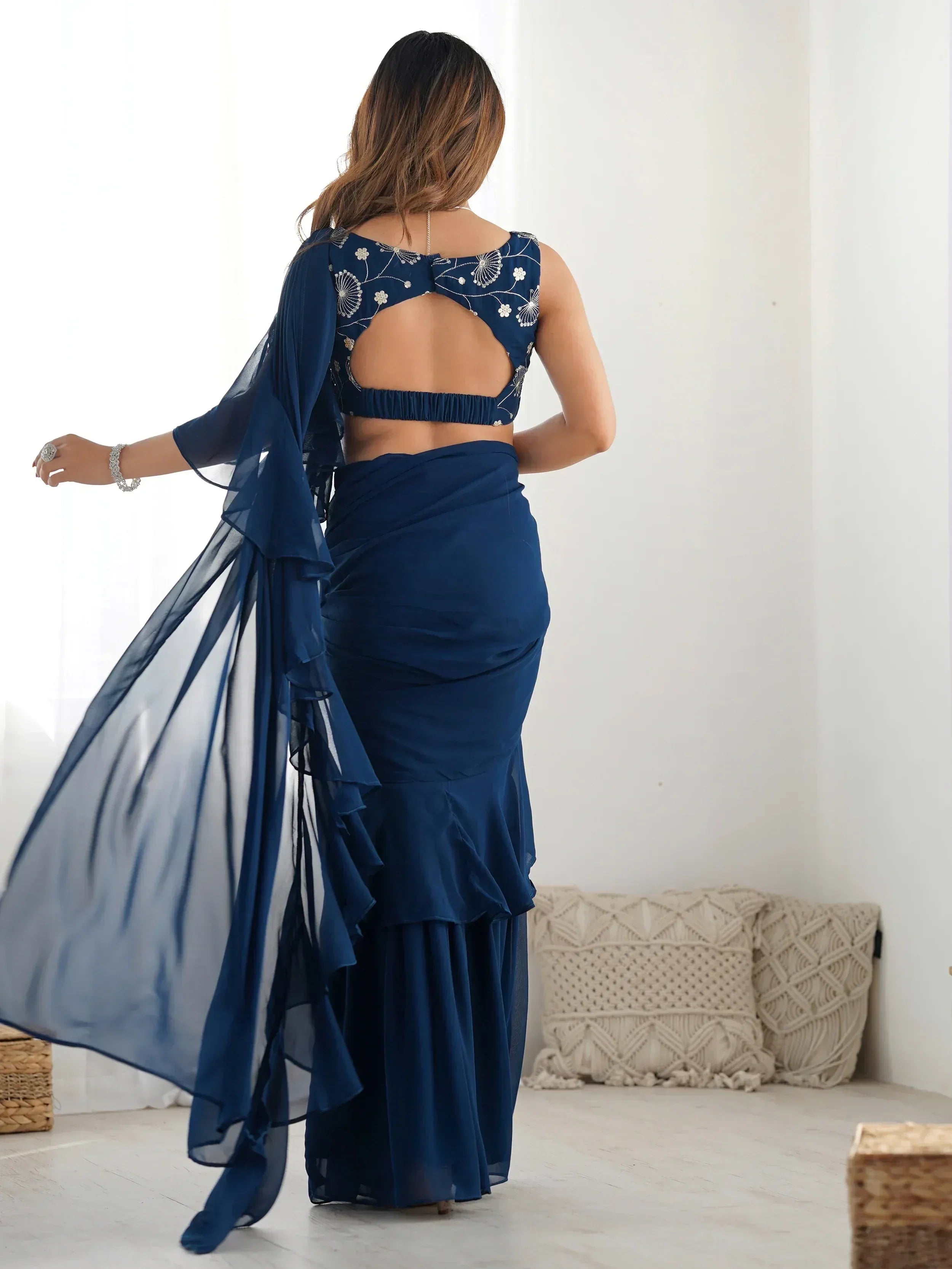 Navy blue designer saree with embroidered backless blouse and ruffled dupatta, ethnic wear for women