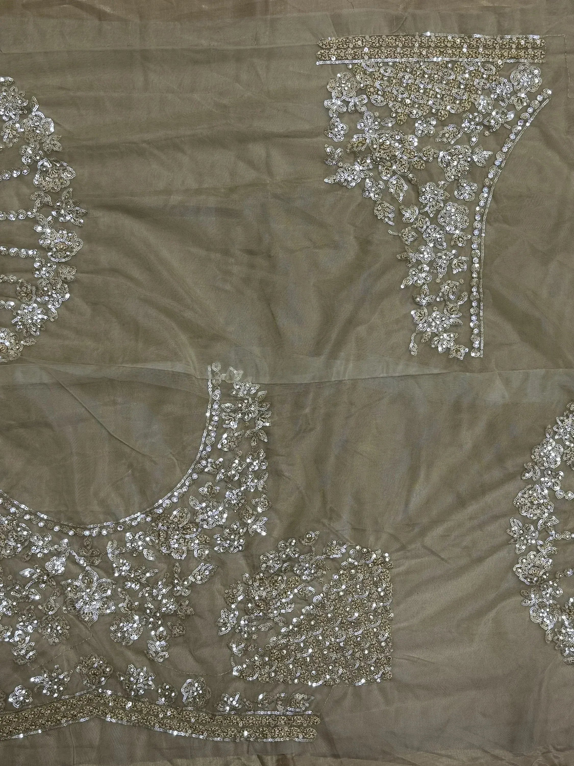 Olive green ethnic wear with intricate silver sequin and bead embroidery, perfect for Indian designer lehenga or saree.